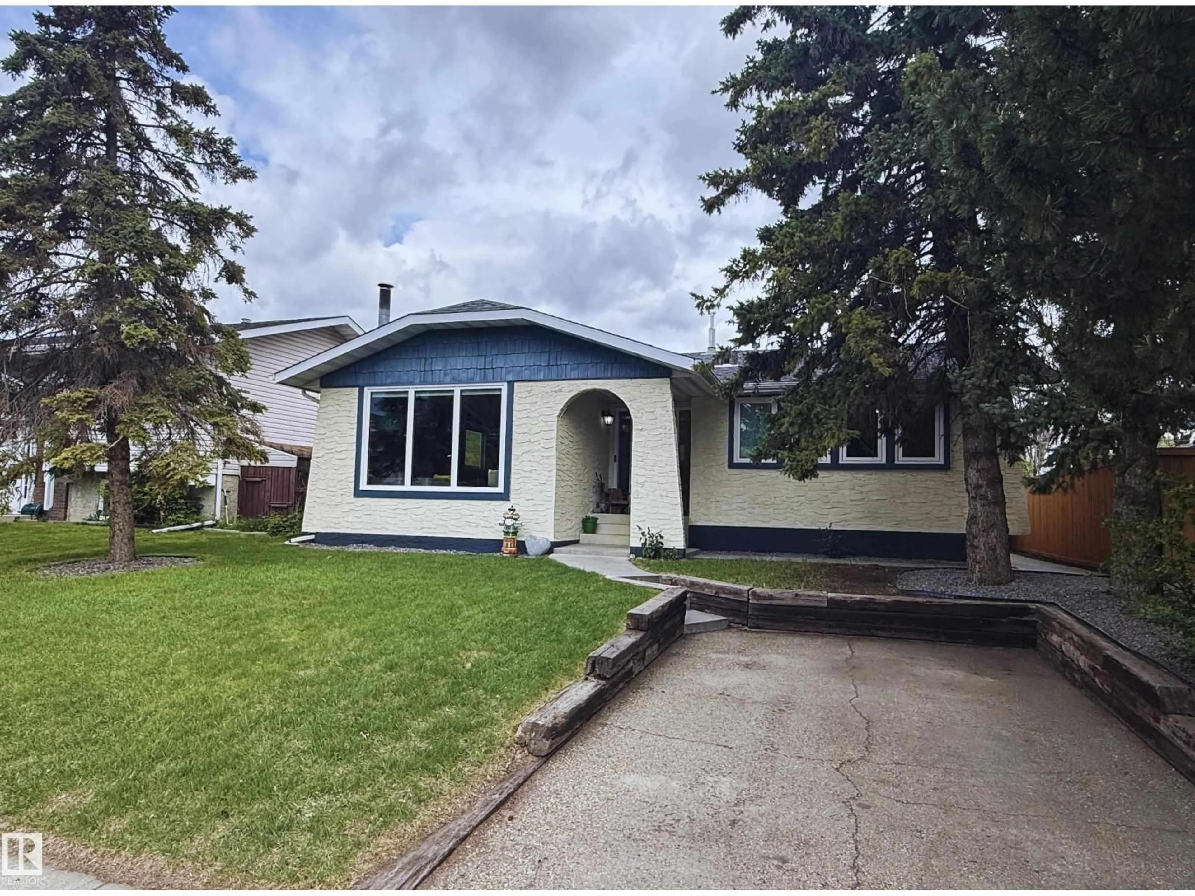 Home with vinyl exterior material, street for 18 WAPITI DR, Devon Alberta T9G1R3