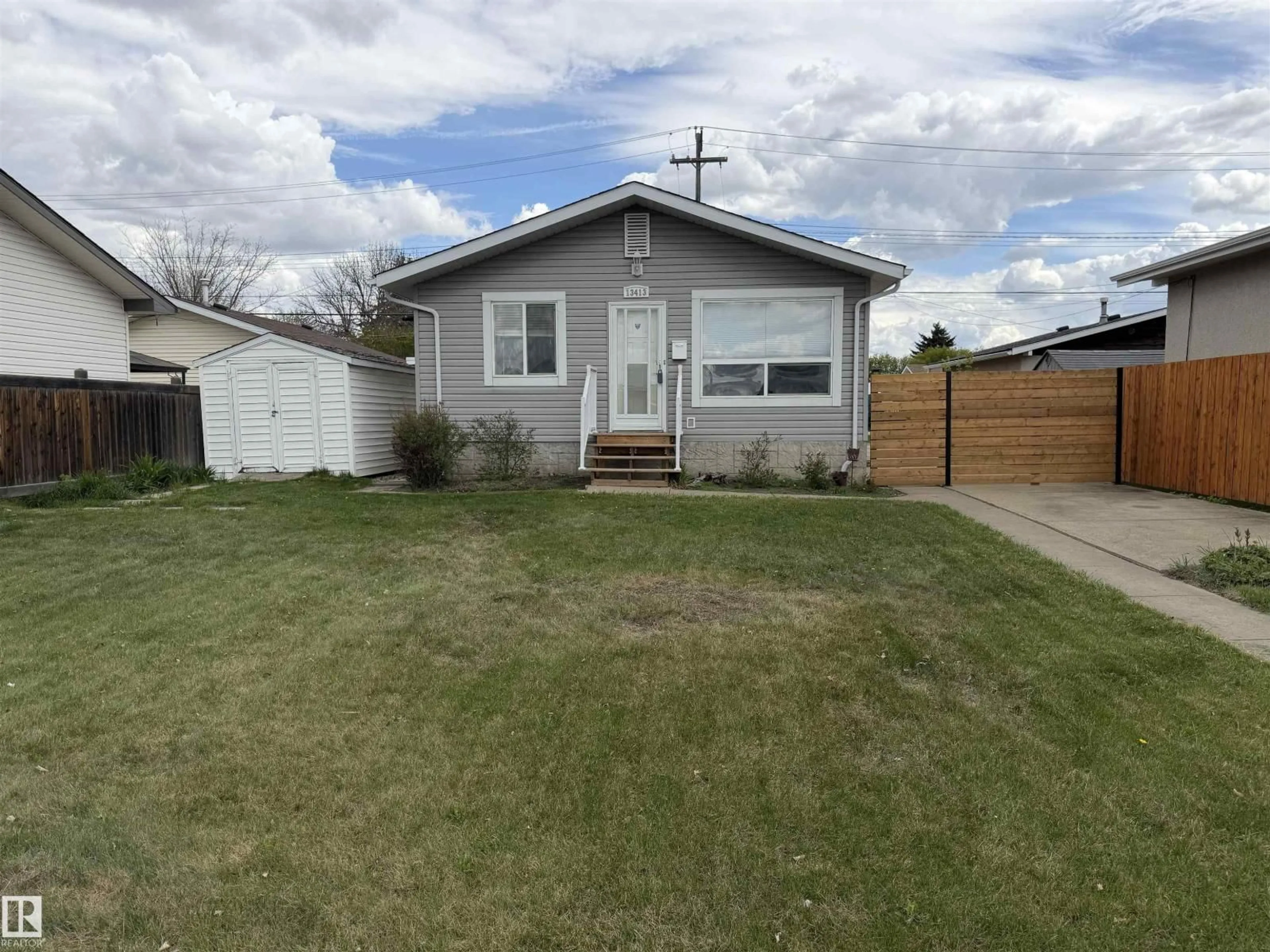 Home with vinyl exterior material, street for 13413 59 ST, Edmonton Alberta T5A0S1
