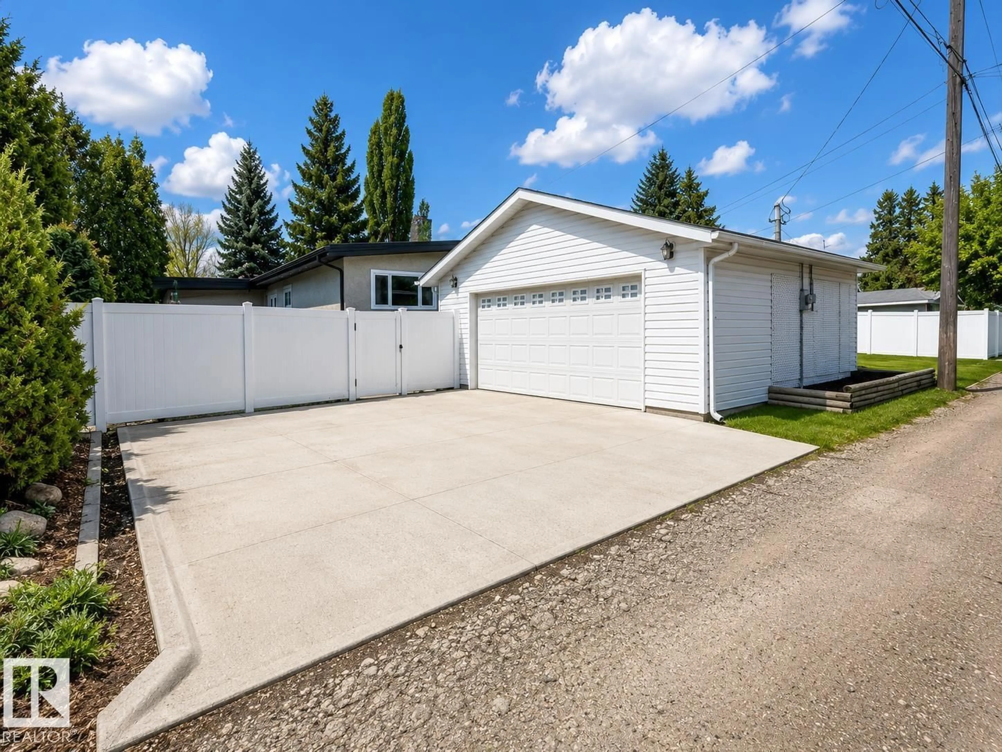 Home with vinyl exterior material, street for 10648 ROWLAND RD, Edmonton Alberta T6A3V8