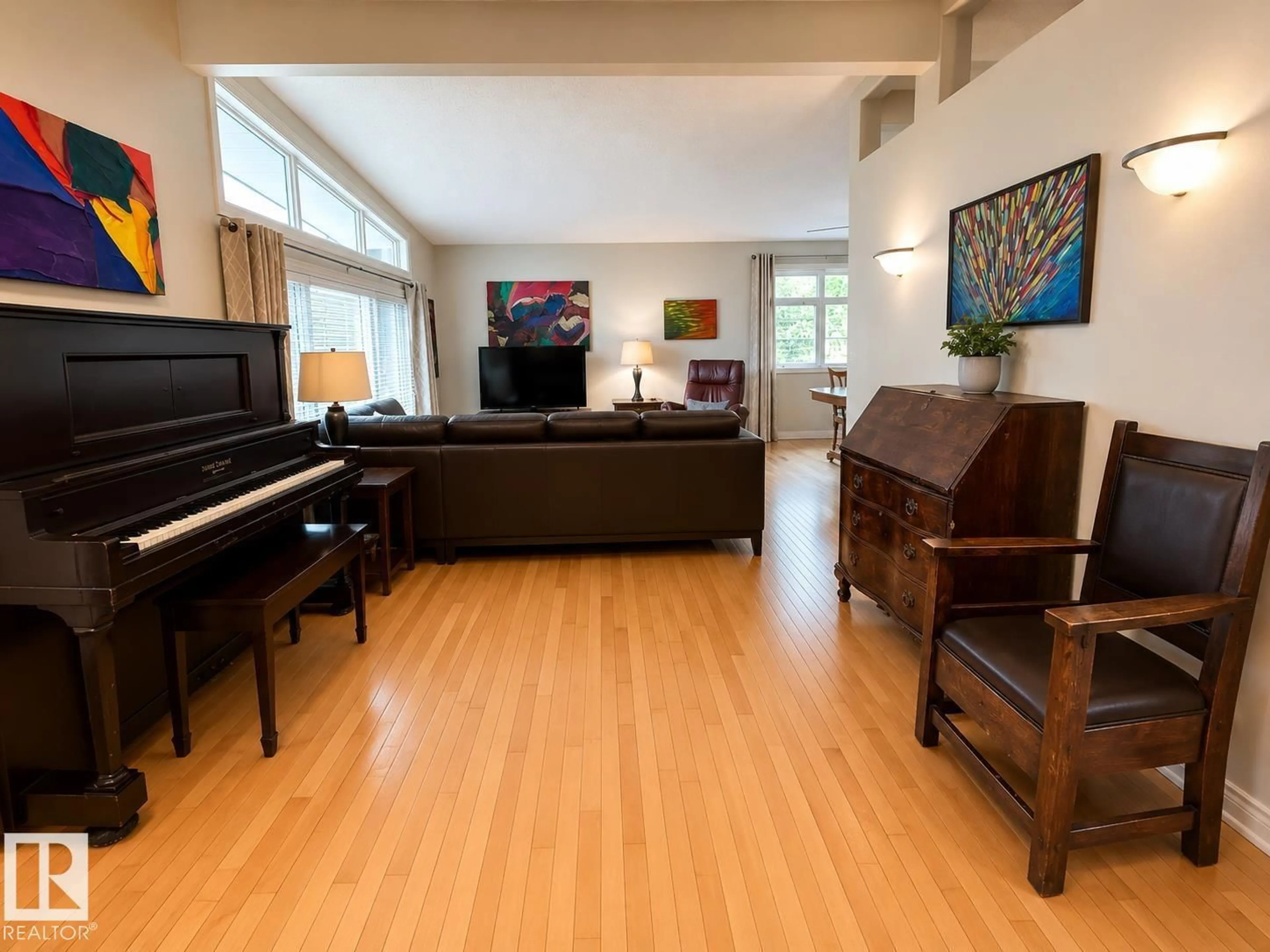 Living room with furniture, wood/laminate floor for 10648 ROWLAND RD, Edmonton Alberta T6A3V8