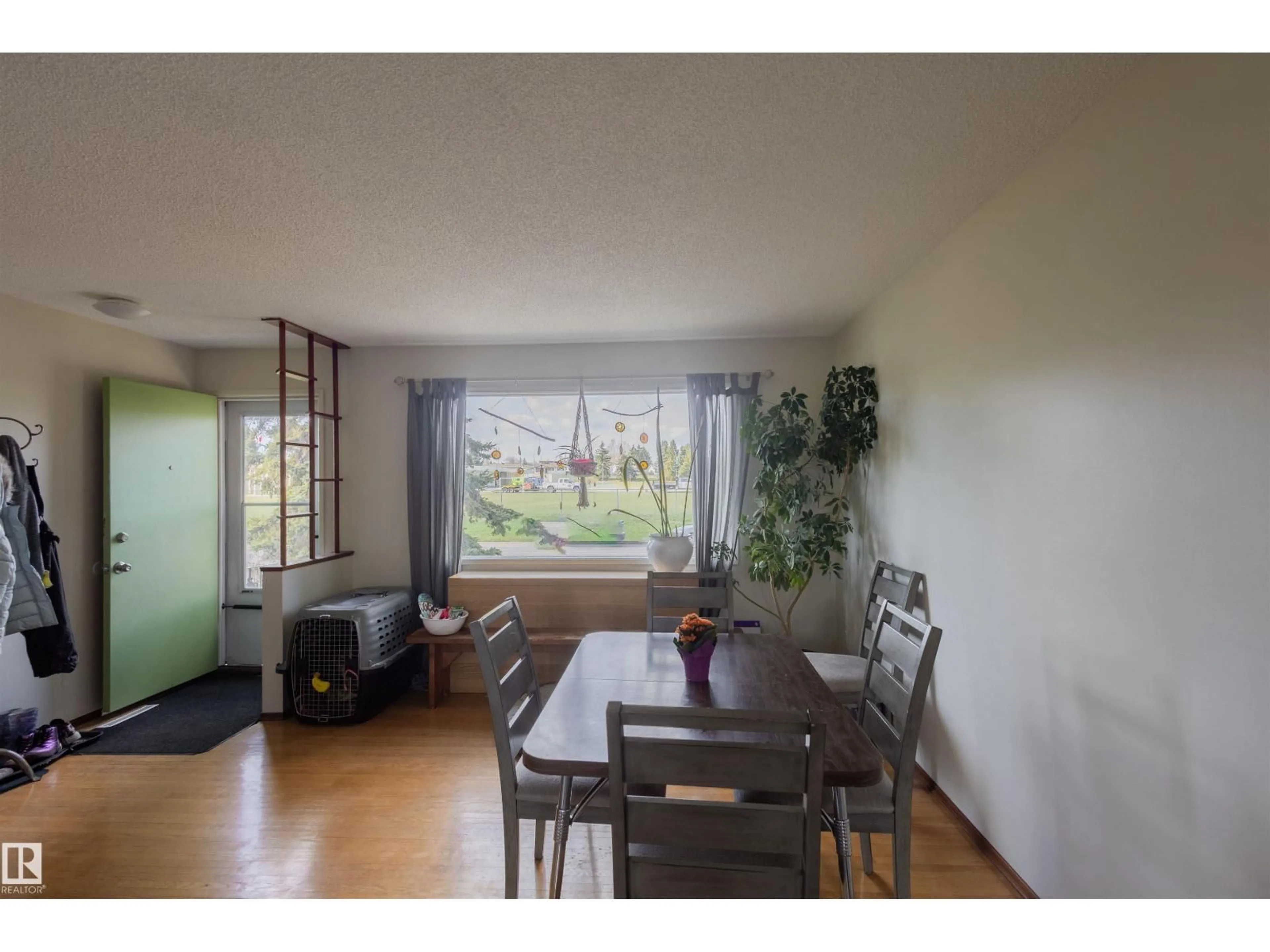 Dining room, wood/laminate floor for 5931 138 AV, Edmonton Alberta T5A1E4
