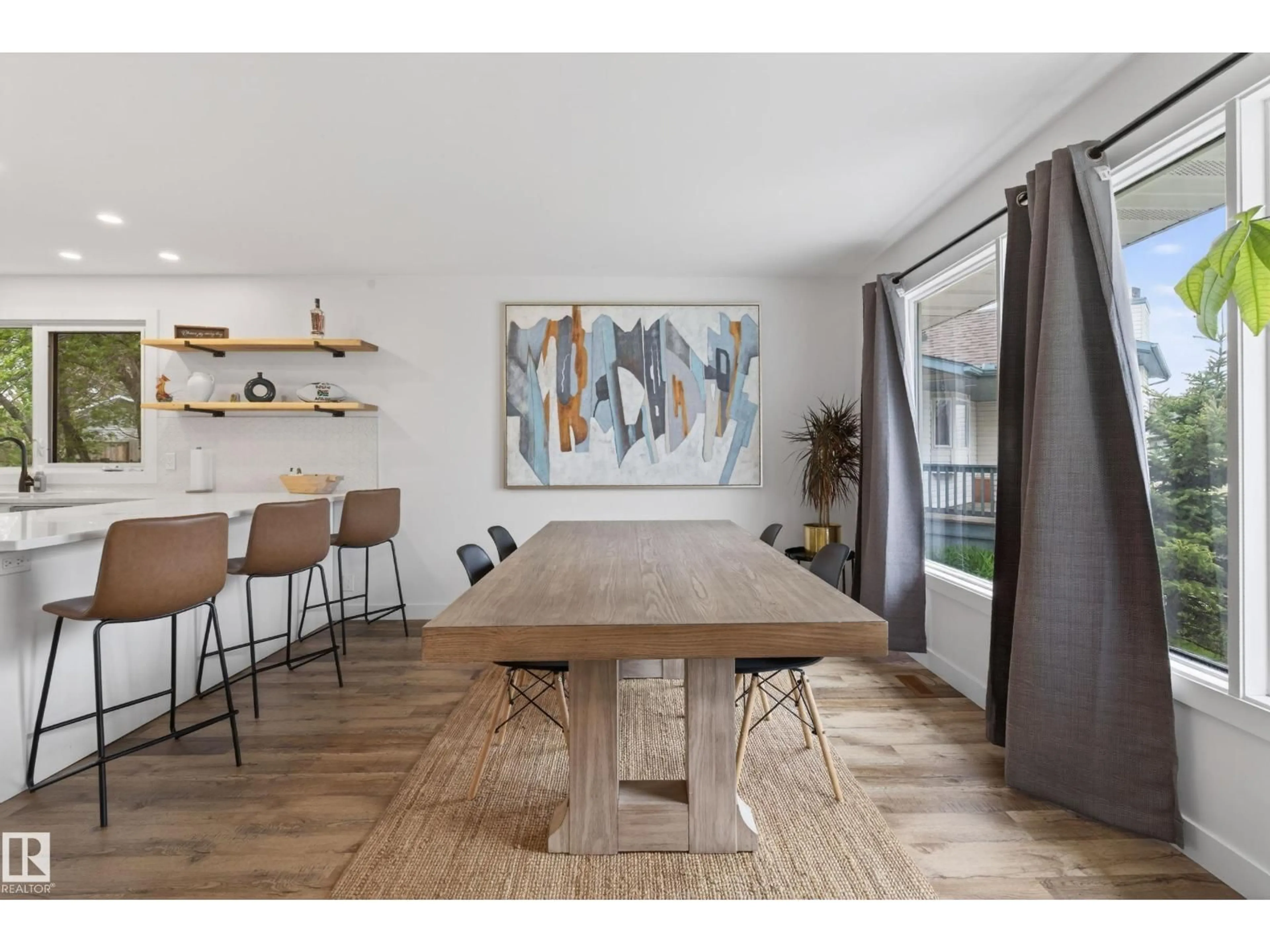 Dining room, wood/laminate floor for NW - 3232 145 AV, Edmonton Alberta T5Y2E5