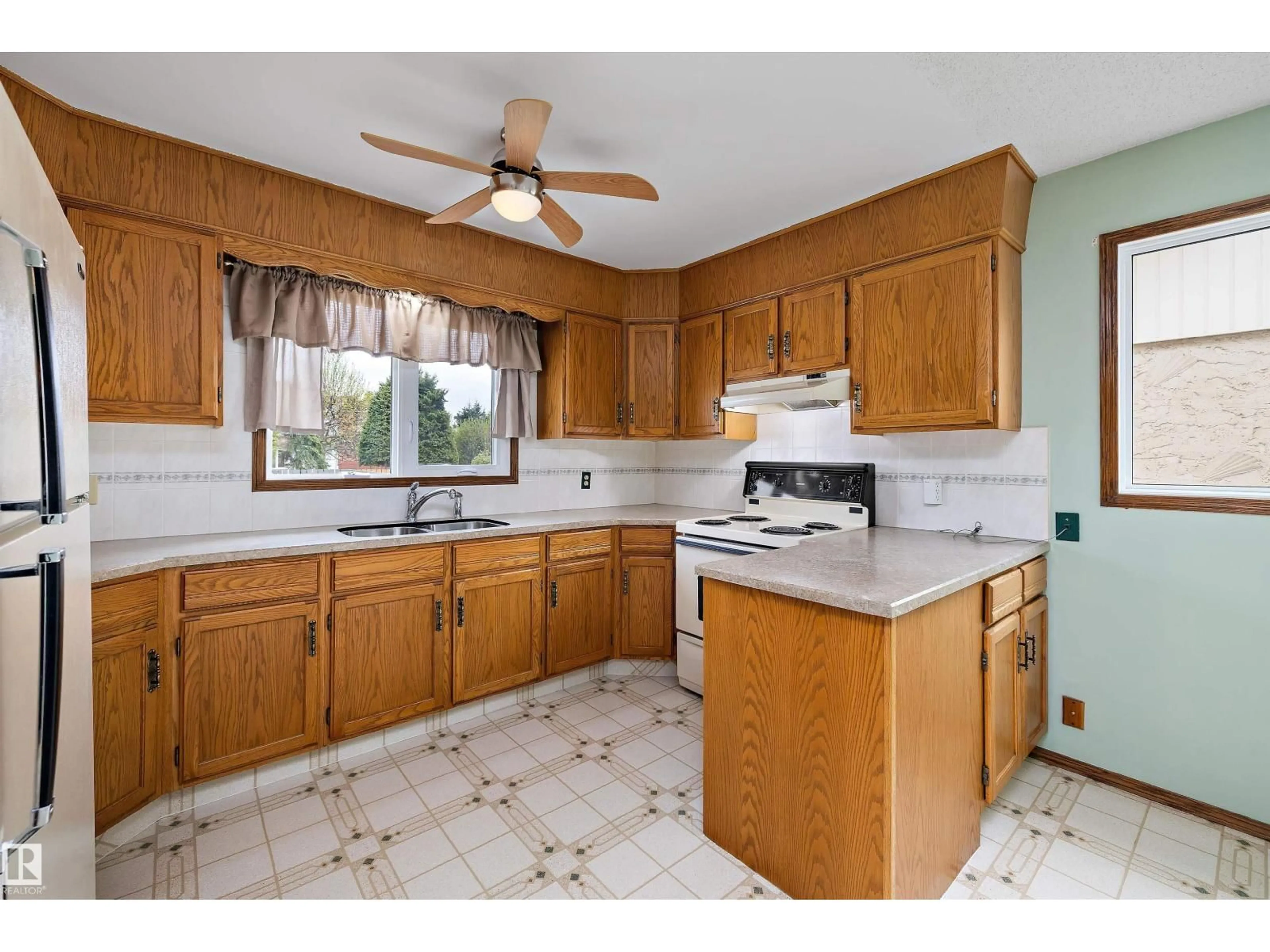 Standard kitchen, ceramic/tile floor for 16307 111 ST, Edmonton Alberta T5X2A9