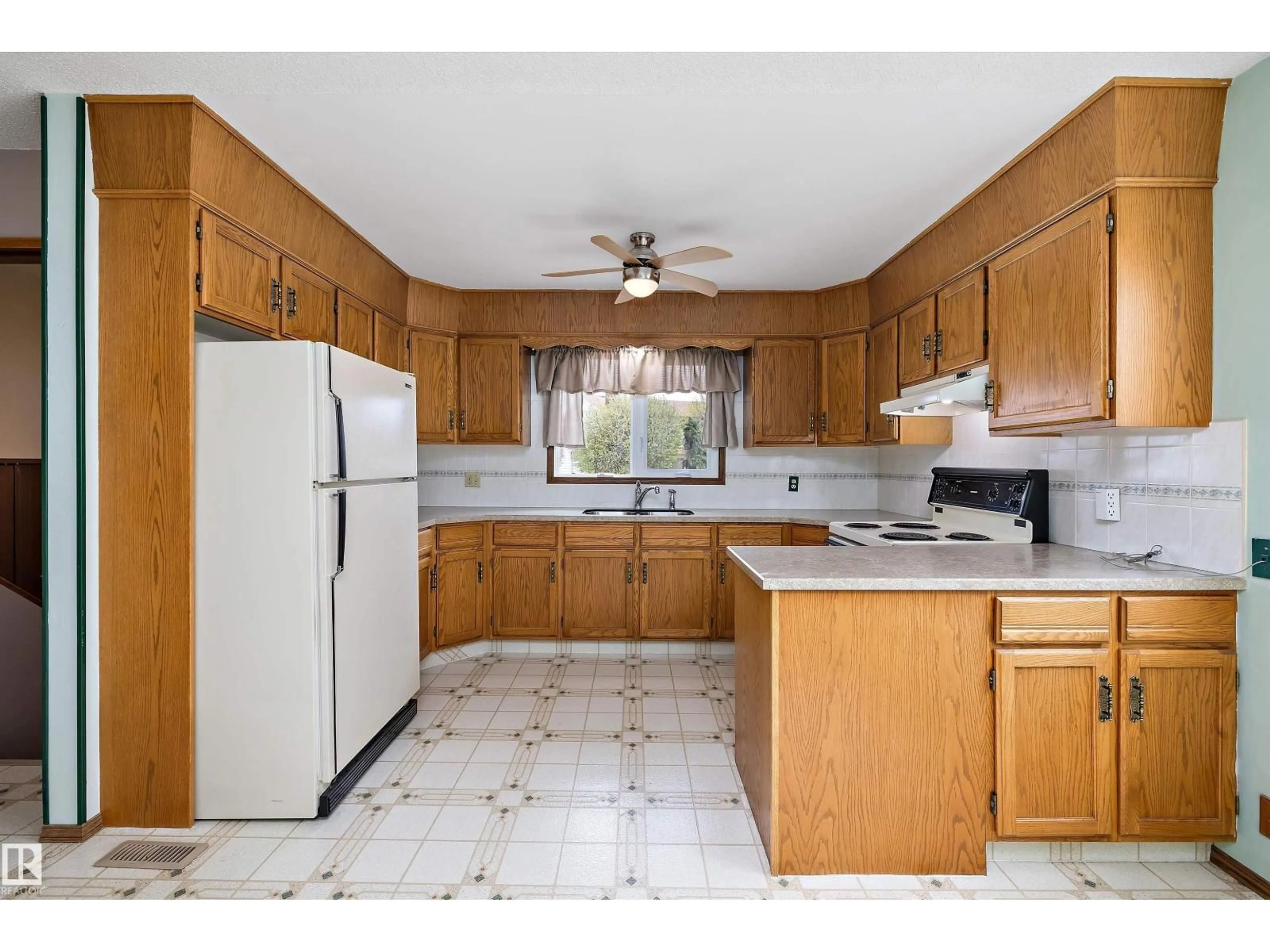Standard kitchen, ceramic/tile floor for 16307 111 ST, Edmonton Alberta T5X2A9