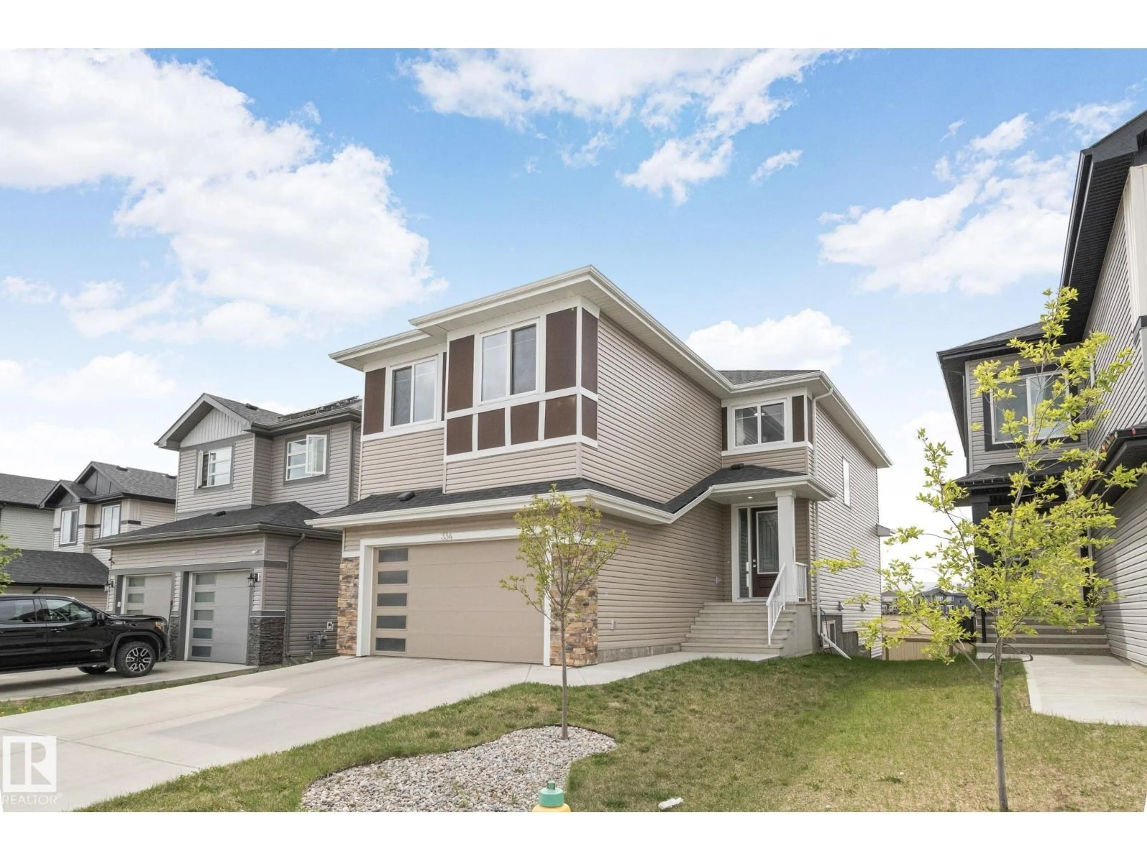 Home with vinyl exterior material, street for 334 ASTON CL, Leduc Alberta T9E1H9