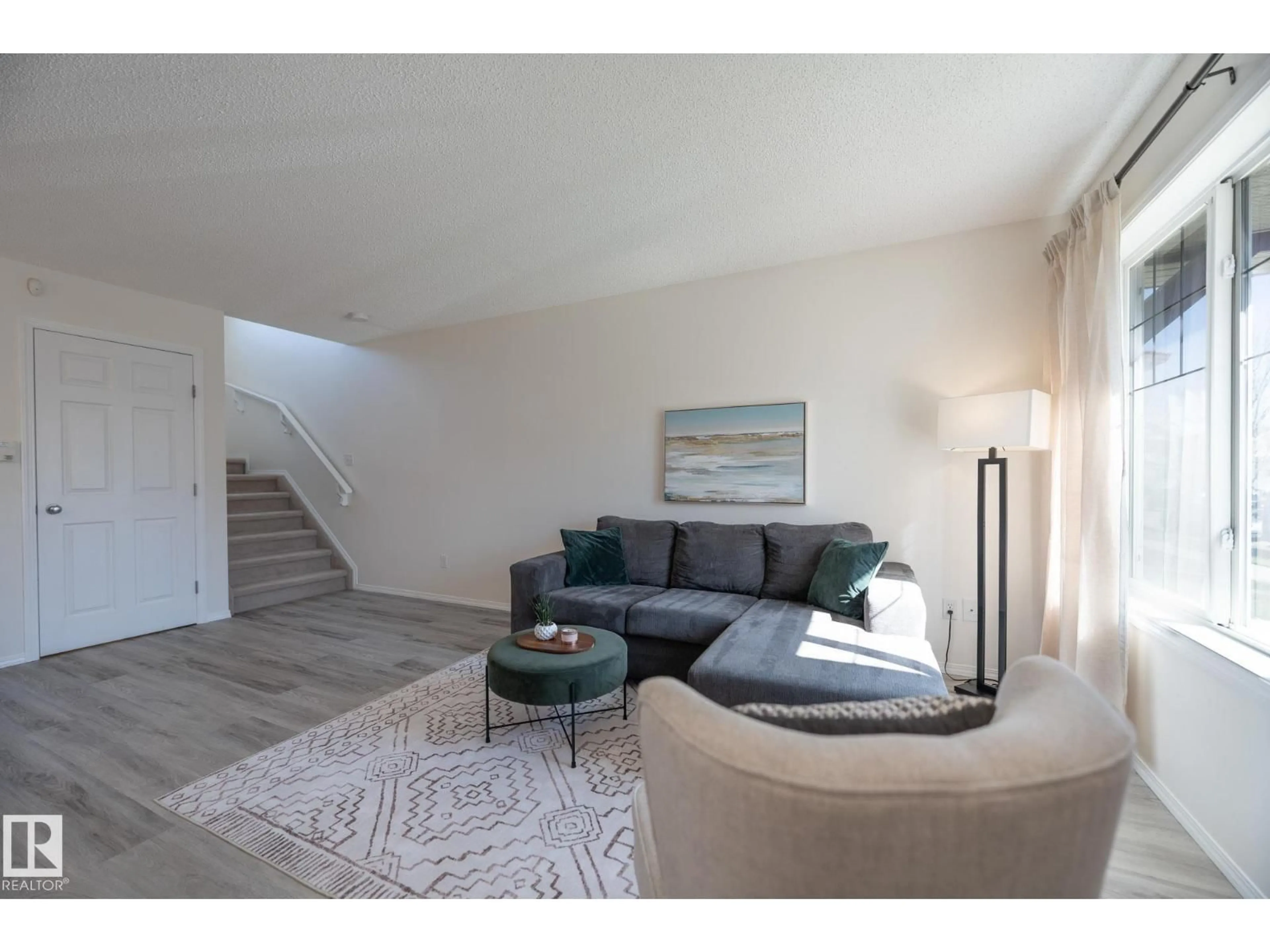 Living room with furniture, unknown for 2928 25 ST, Edmonton Alberta T6T1Z9
