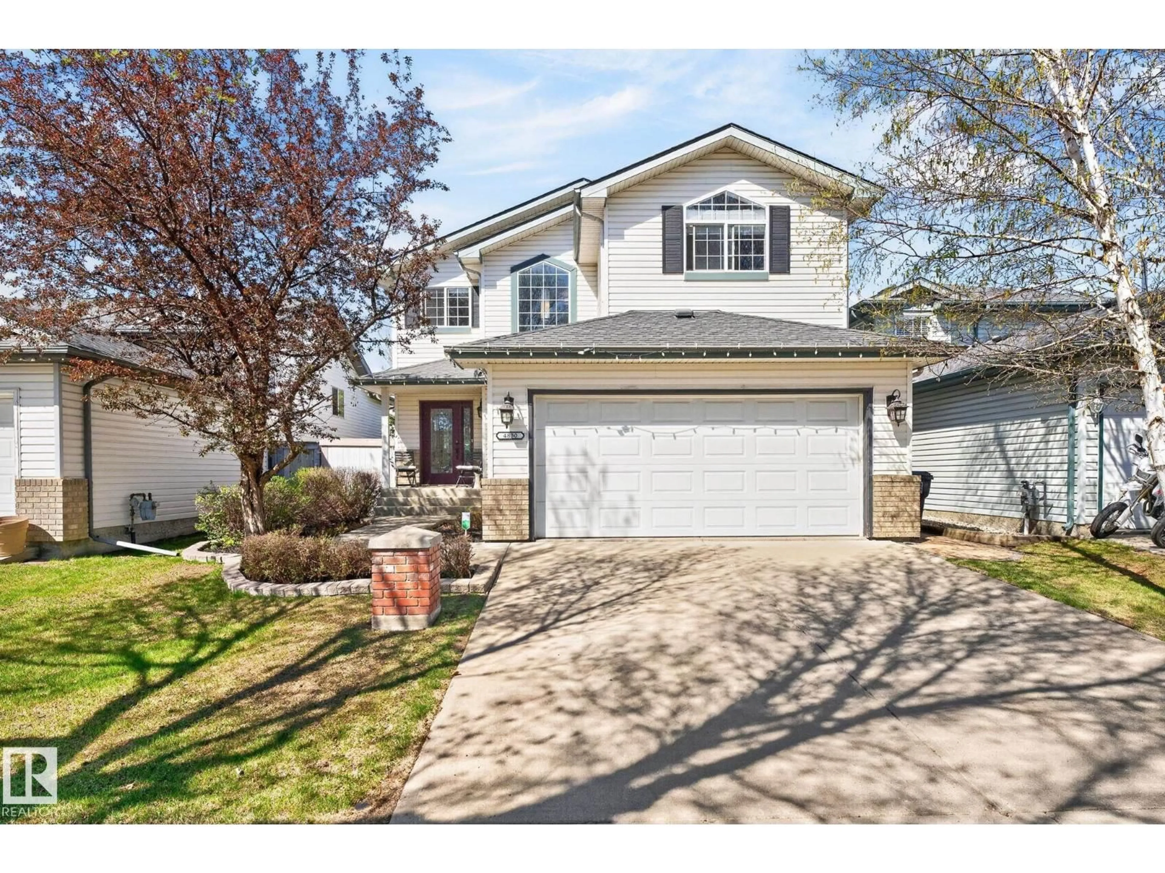 Home with vinyl exterior material, street for NW - 4830 188 ST, Edmonton Alberta T6M2S2