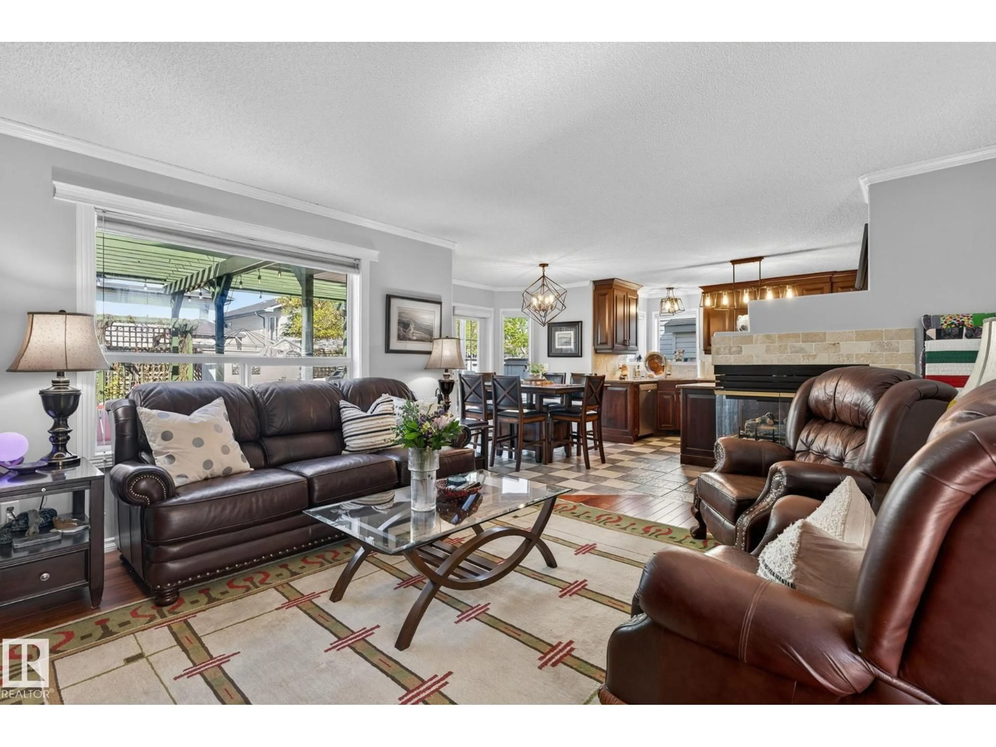 Living room with furniture, ceramic/tile floor for NW - 4830 188 ST, Edmonton Alberta T6M2S2