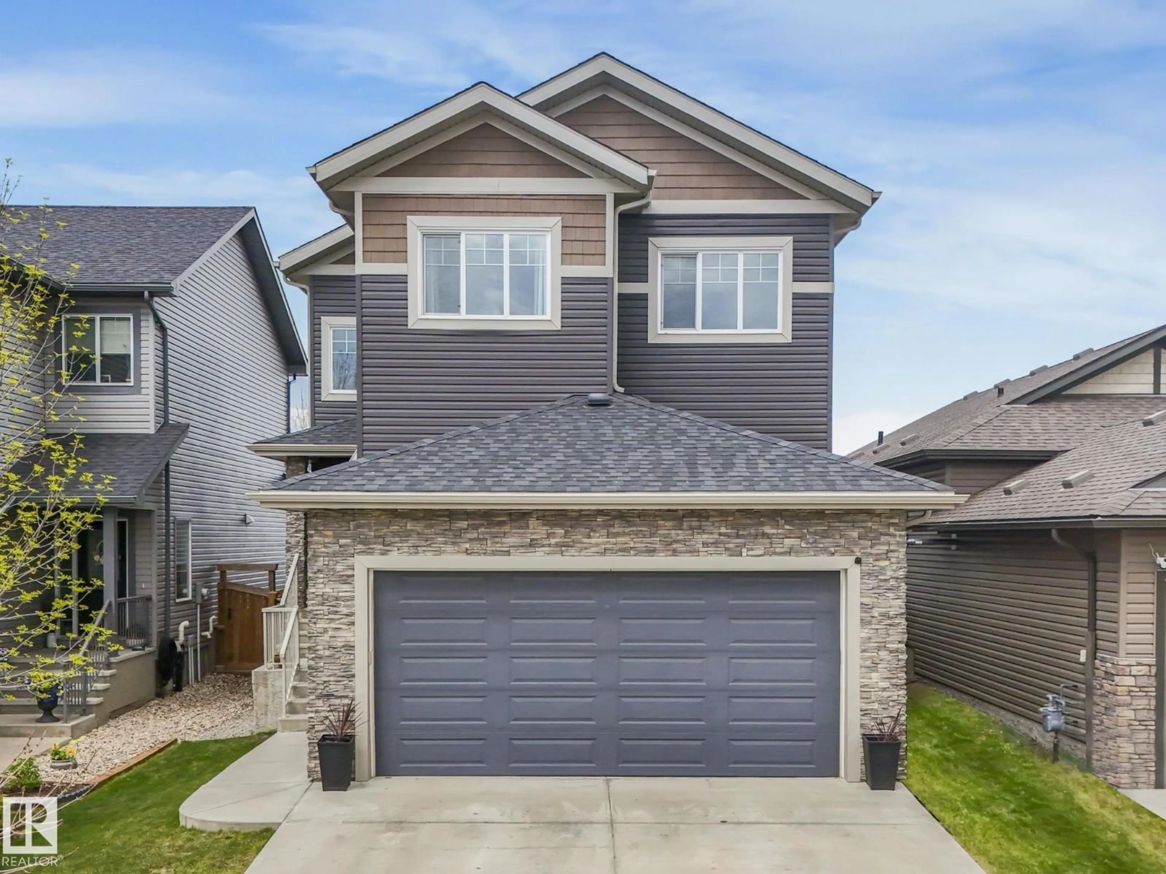 Home with brick exterior material, street for 12 SANDALWOOD PL, Leduc Alberta T9E1C2