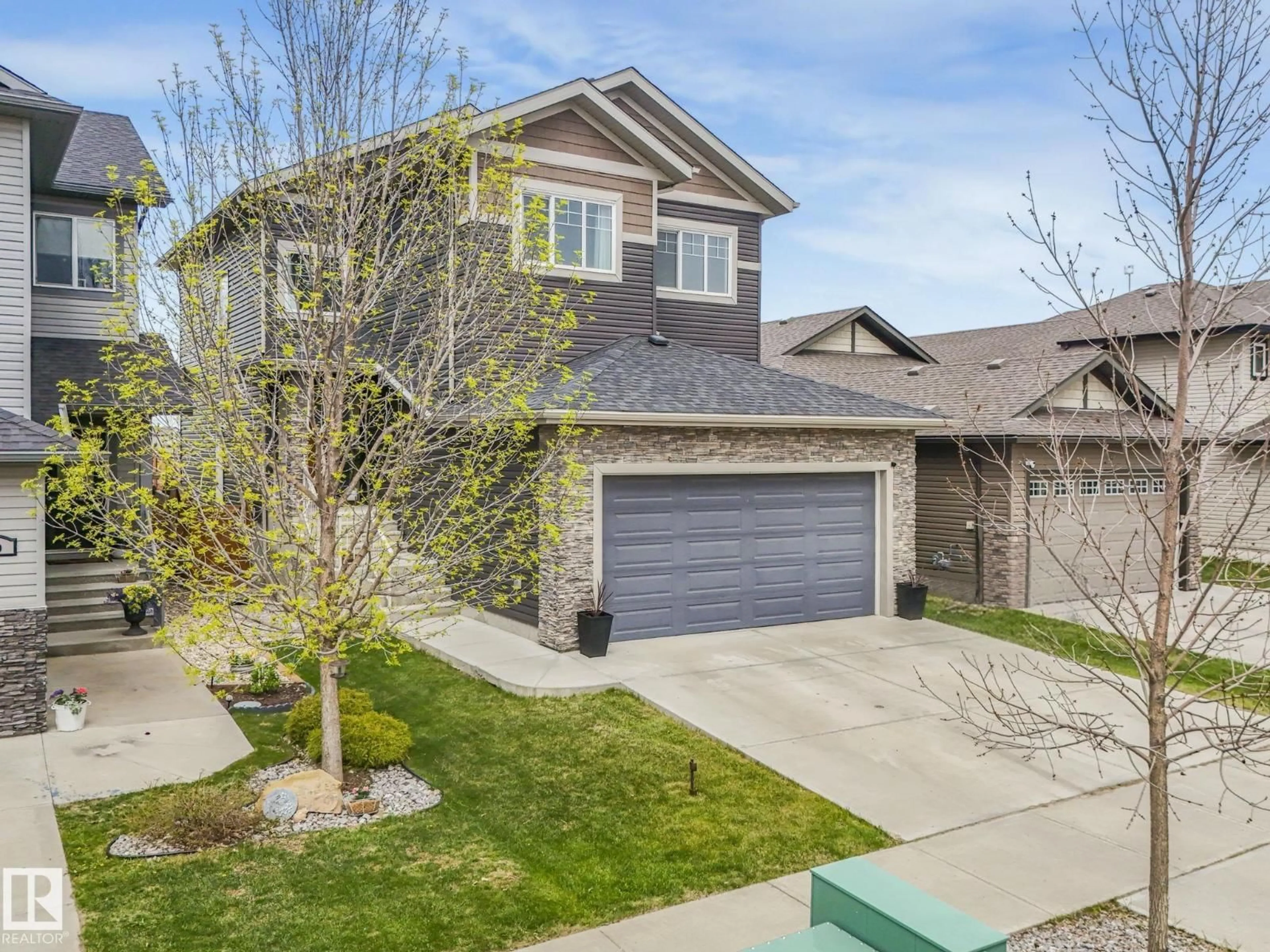 A pic from outside/outdoor area/front of a property/back of a property/a pic from drone, street for 12 SANDALWOOD PL, Leduc Alberta T9E1C2