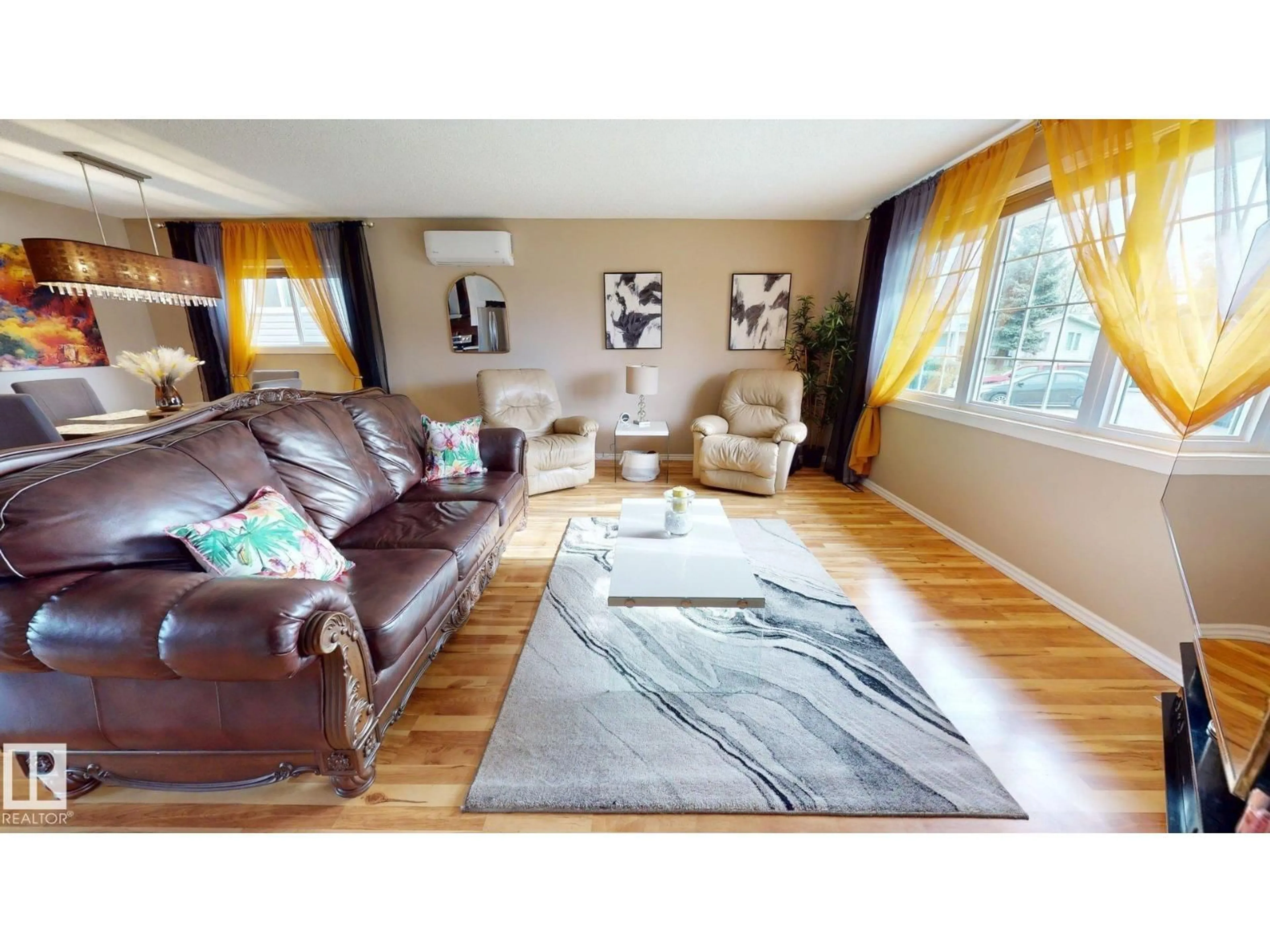 Living room with furniture, wood/laminate floor for 9616 169 ST, Edmonton Alberta T5P3X2