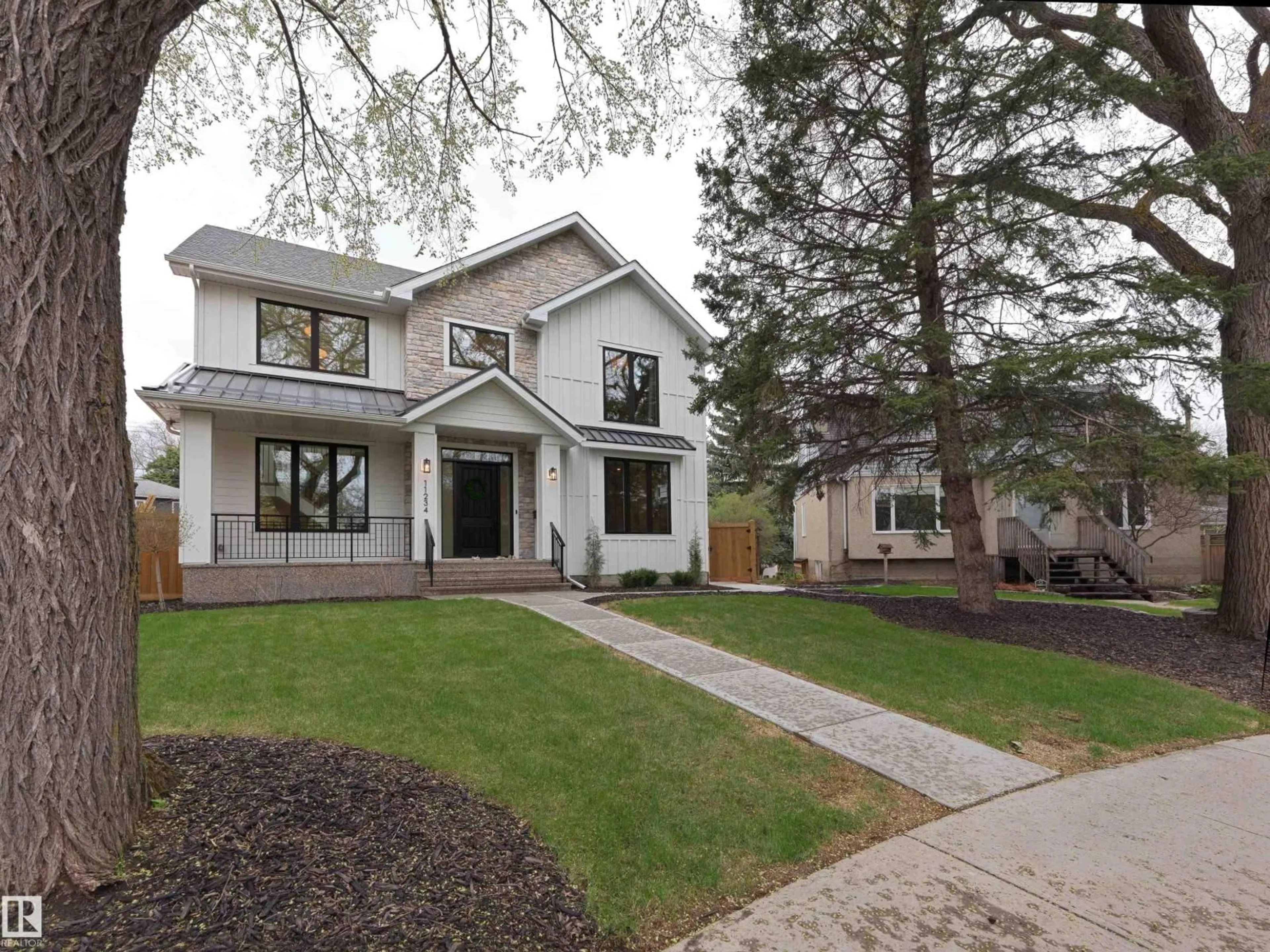 Home with brick exterior material, street for 11234 73 AV, Edmonton Alberta T6G0C6