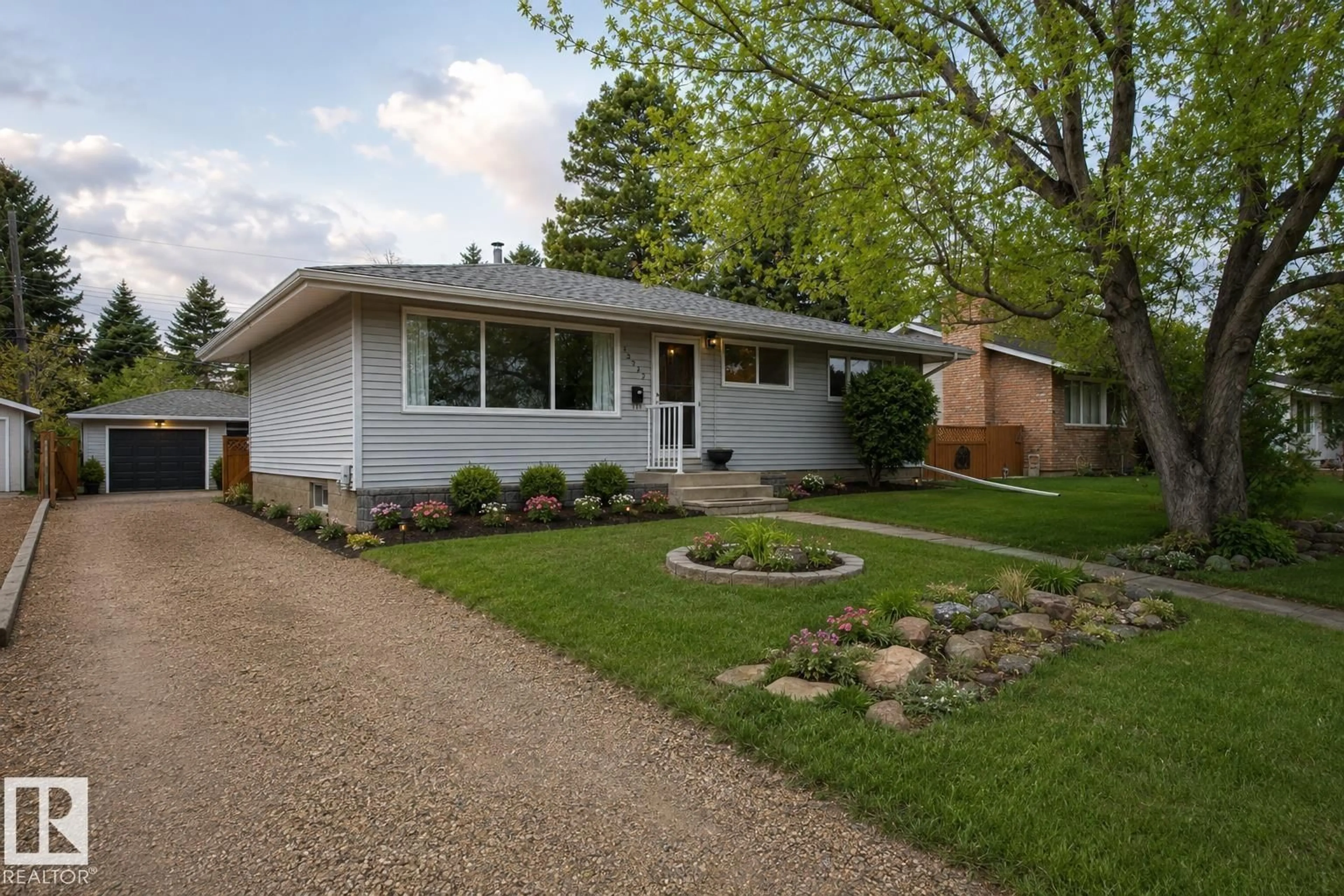 Home with brick exterior material, street for 13312 137 ST, Edmonton Alberta T5L2A9