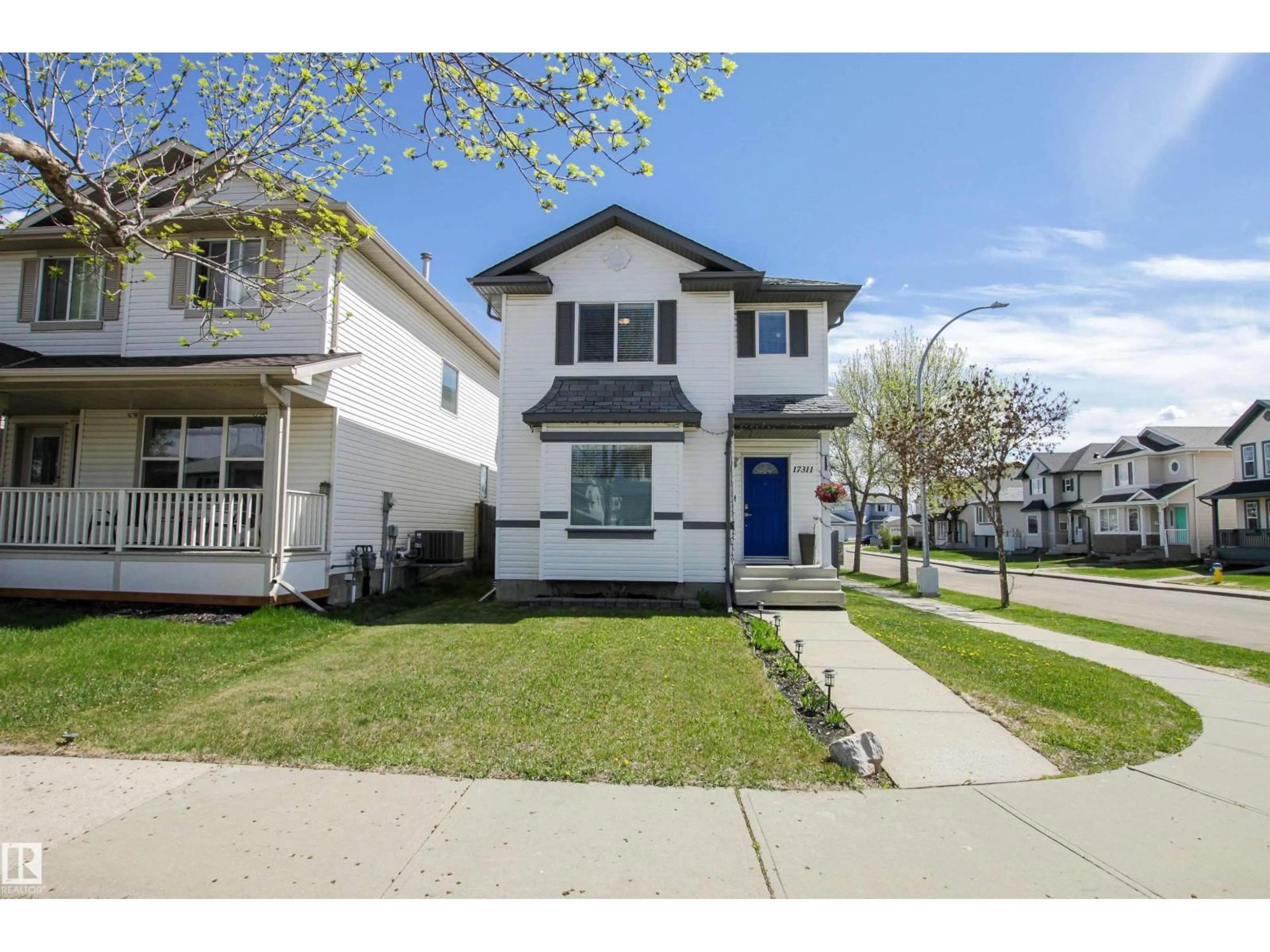 Home with vinyl exterior material, street for NW - 17311 90 ST, Edmonton Alberta T5Z3W6