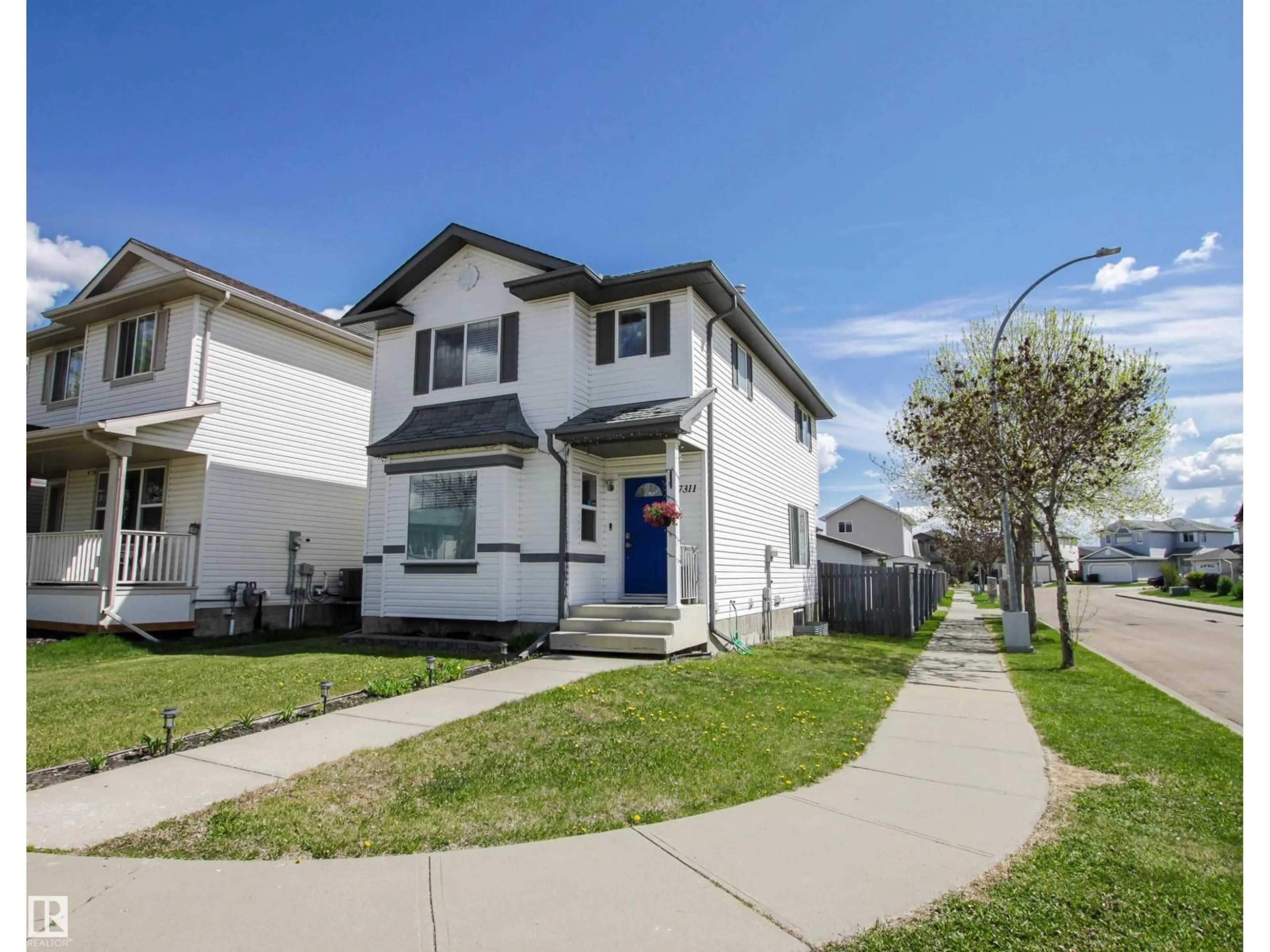 Home with vinyl exterior material, street for NW - 17311 90 ST, Edmonton Alberta T5Z3W6