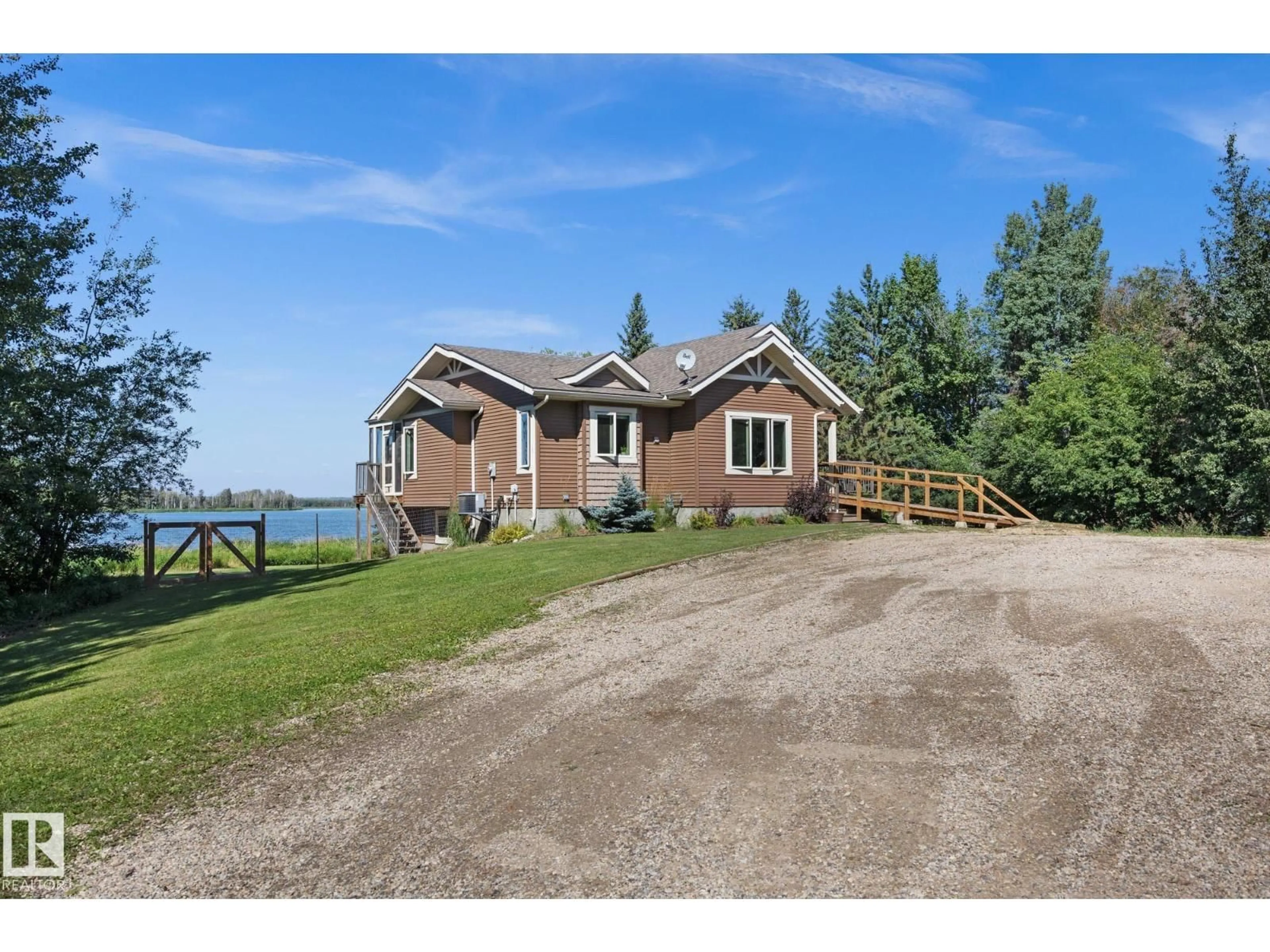 A pic from outside/outdoor area/front of a property/back of a property/a pic from drone, water/lake/river/ocean view for 52502 - #116 RGE ROAD 25, Rural Parkland County Alberta T7Y2M2