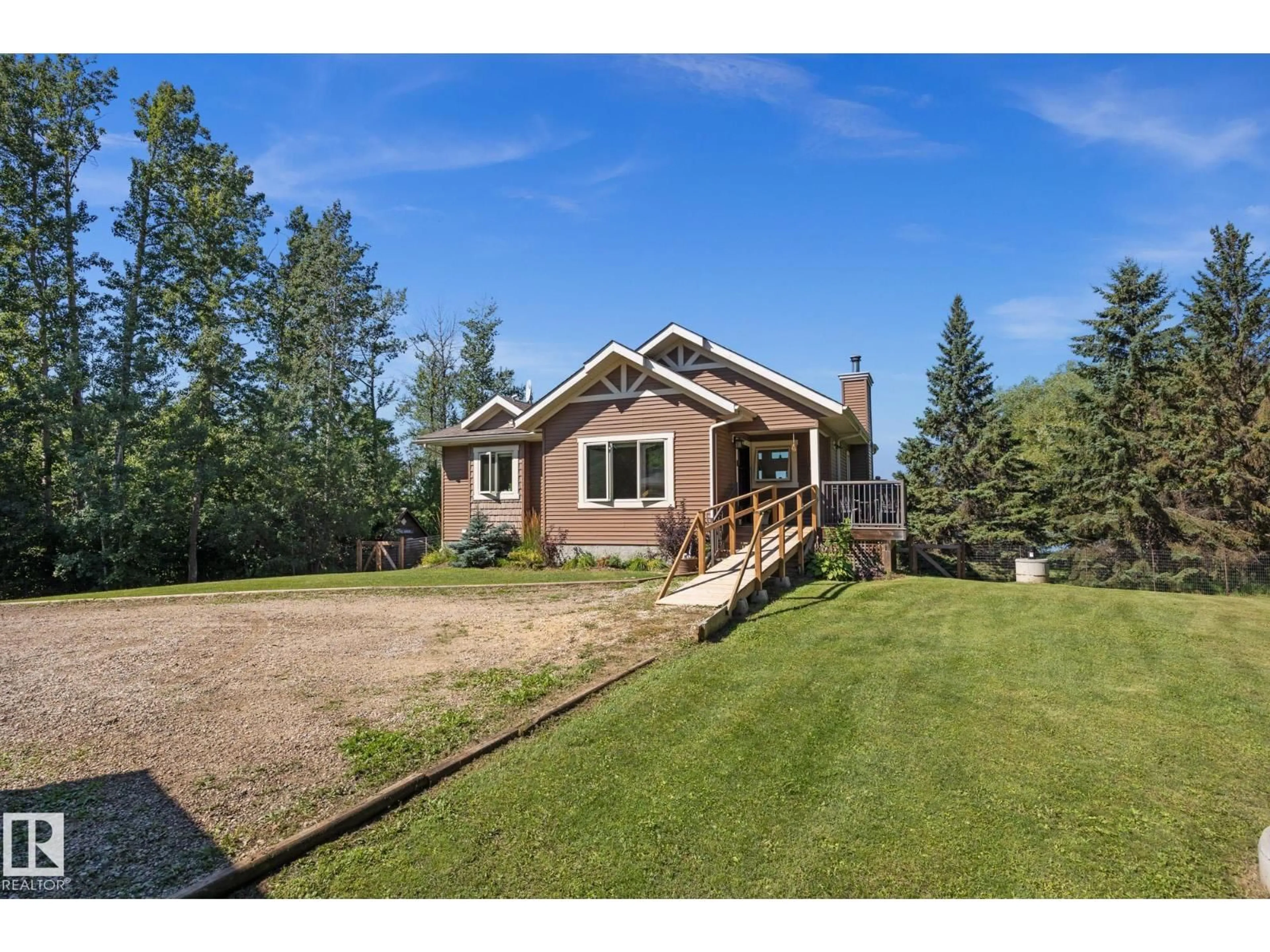 A pic from outside/outdoor area/front of a property/back of a property/a pic from drone, mountain view for 52502 - #116 RGE ROAD 25, Rural Parkland County Alberta T7Y2M2