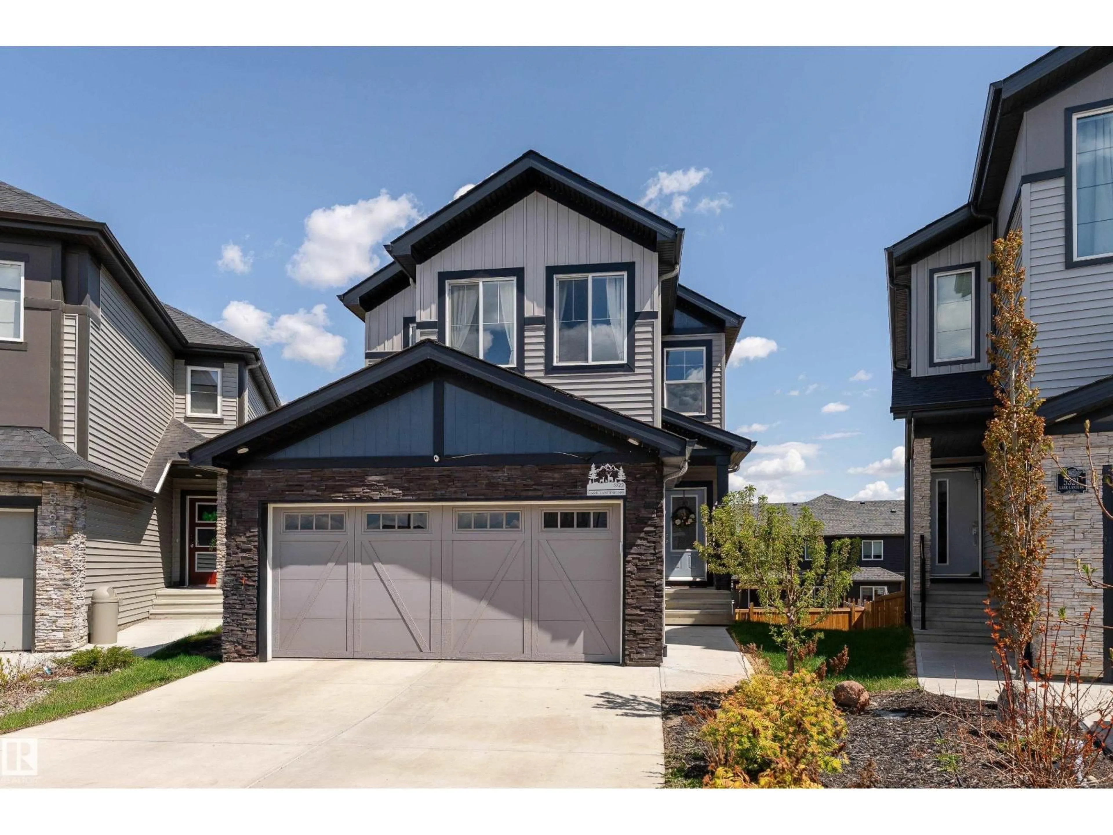 Home with vinyl exterior material, street for 5323 LARK LANDING LD, Edmonton Alberta T5S0P2