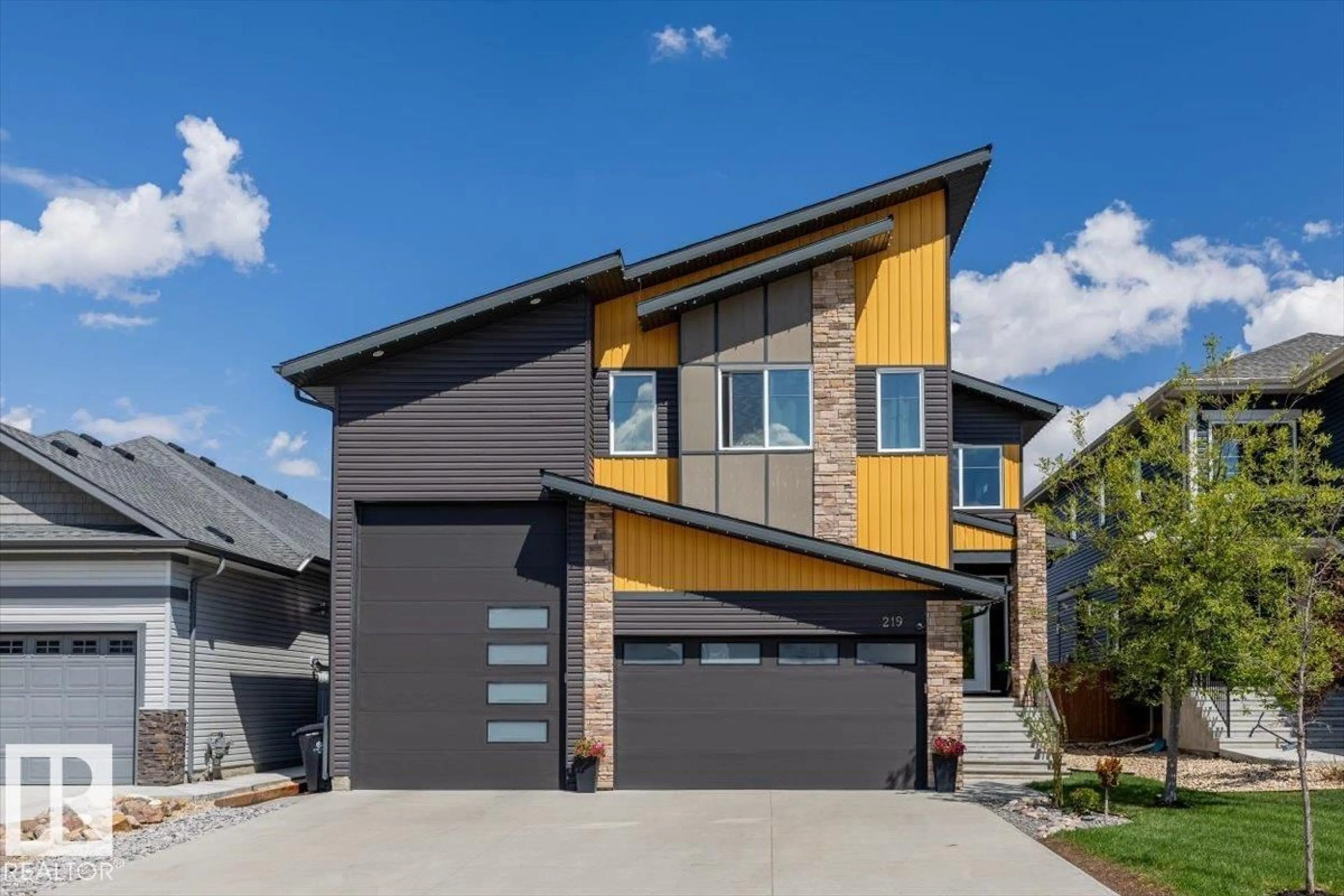 Home with vinyl exterior material, street for 219 CRANBERRY BN, Fort Saskatchewan Alberta T8L0R4