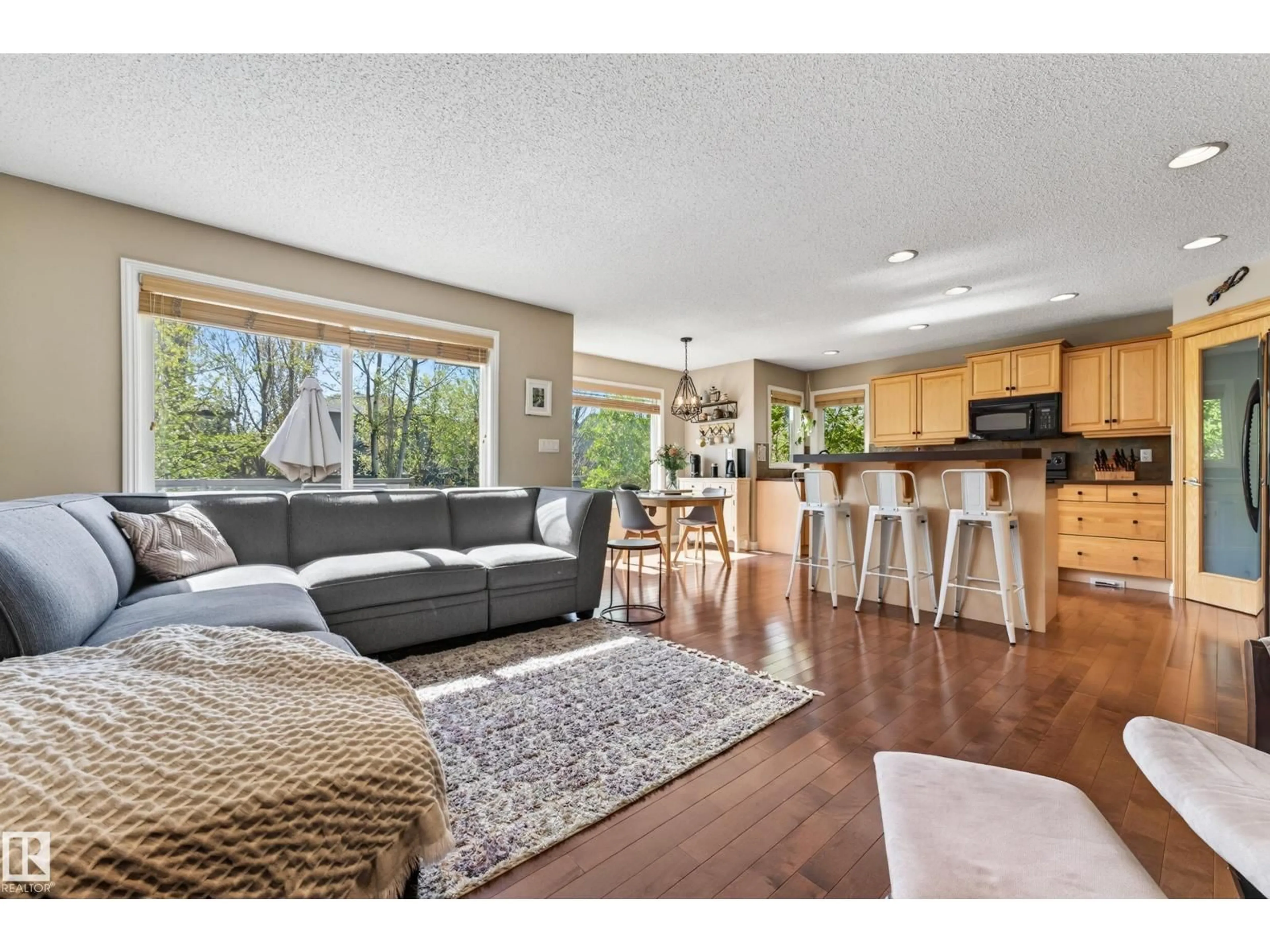 Open concept kitchen, wood/laminate floor for 1907 120 ST, Edmonton Alberta T6W0A9