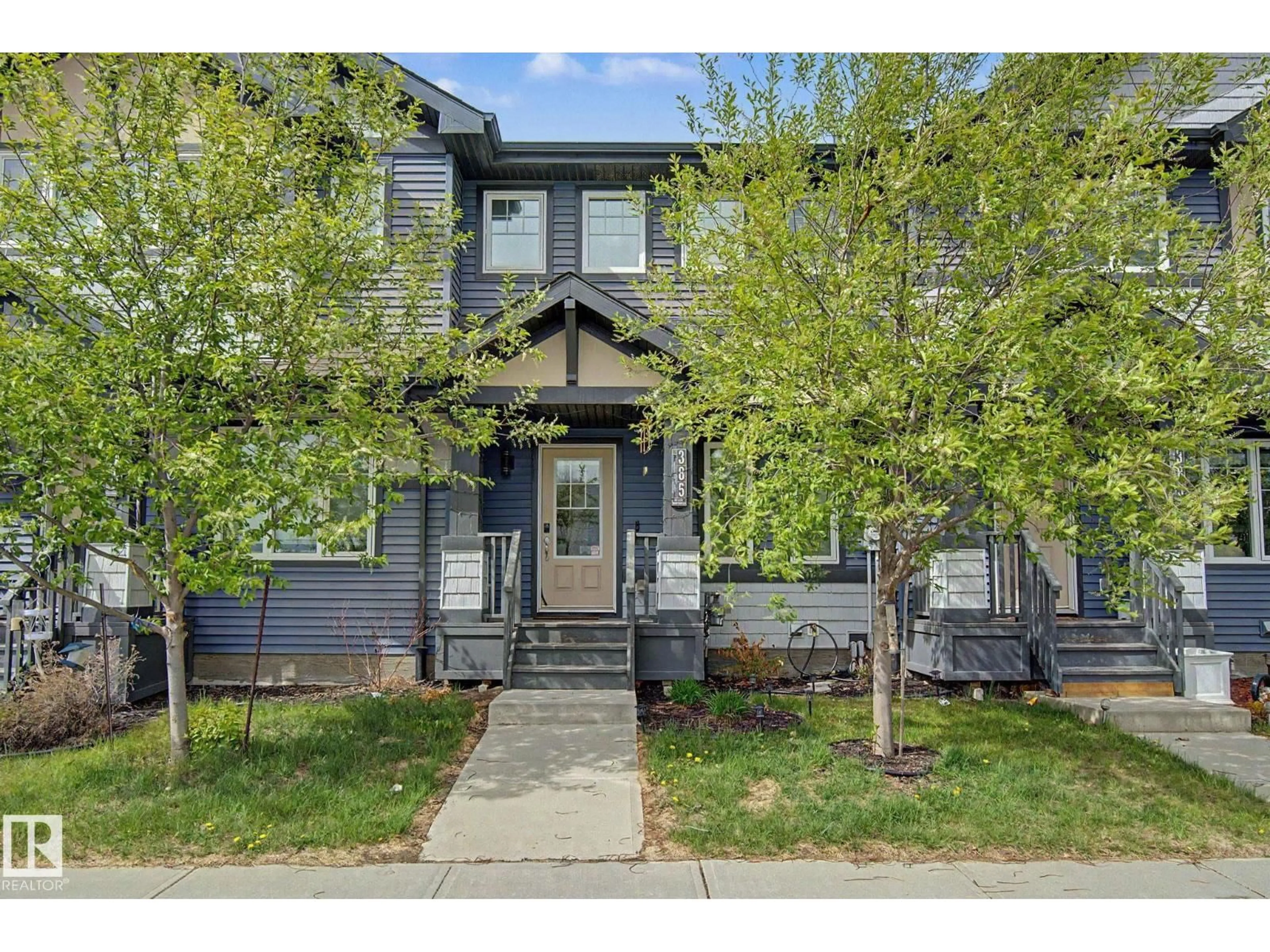 Home with vinyl exterior material, street for 385 ORCHARDS BV, Edmonton Alberta T6X2E1