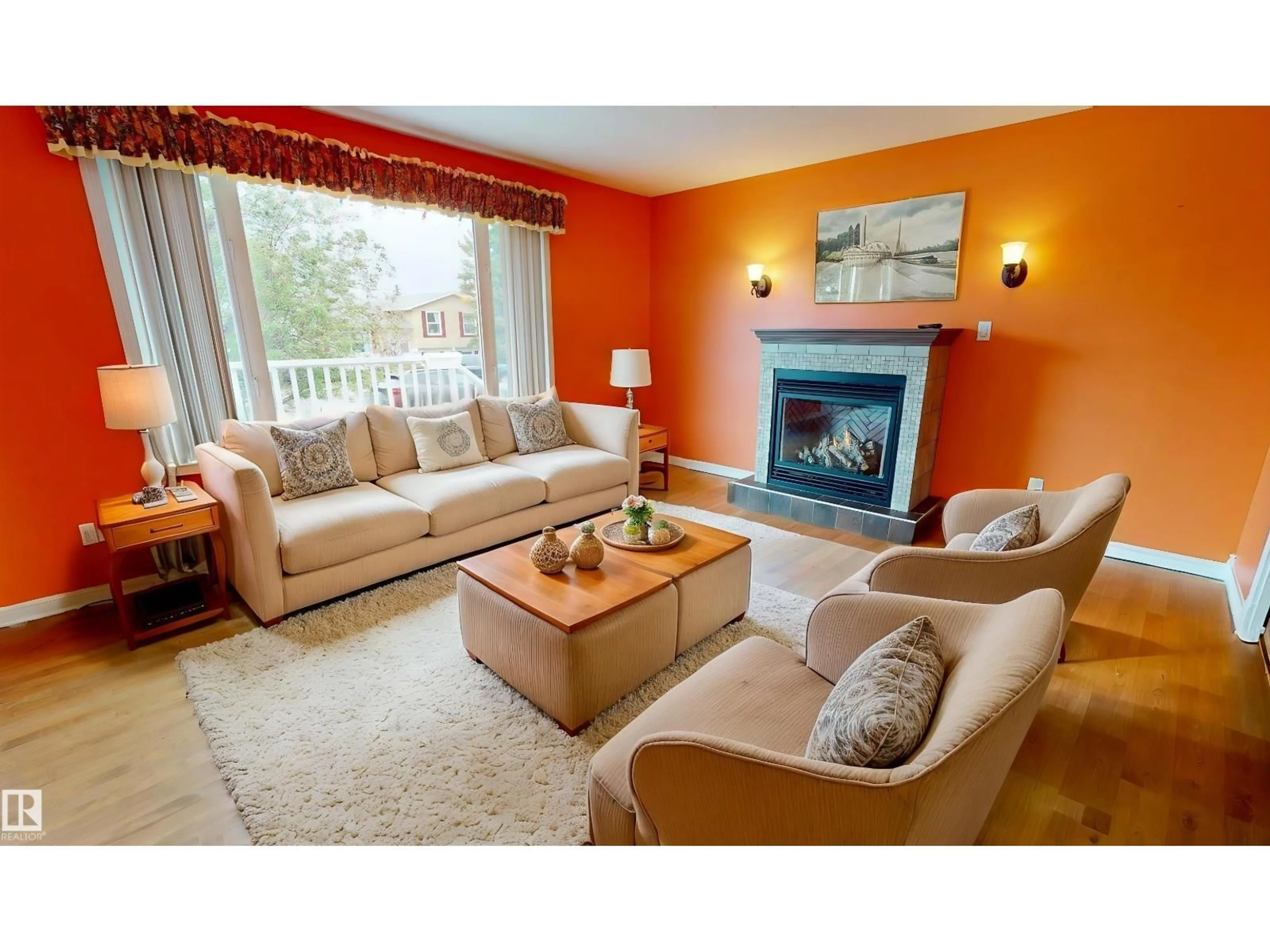 Living room with furniture, wood/laminate floor for NW - 14252 83 ST, Edmonton Alberta T5E2X9