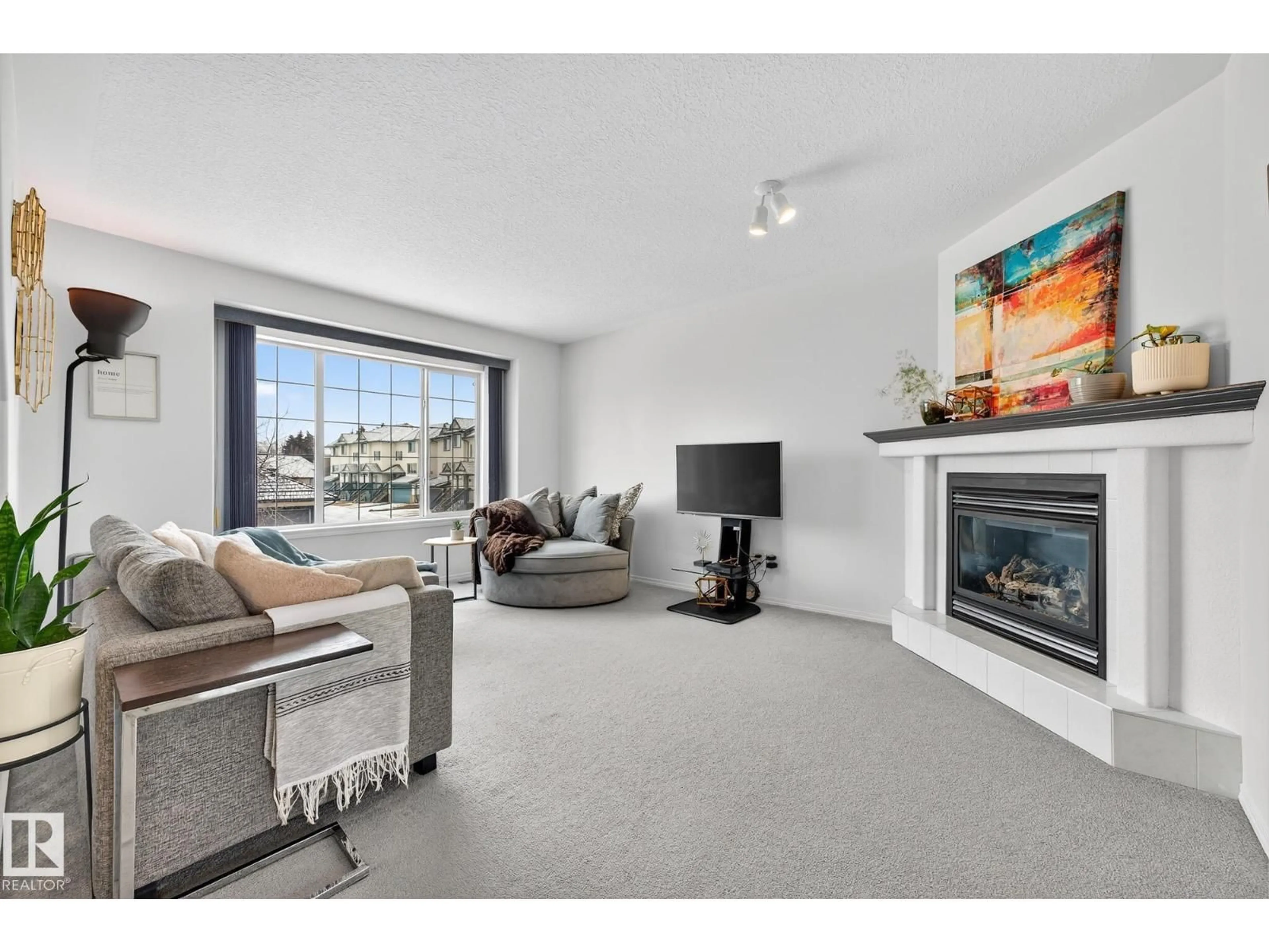 Living room with furniture, unknown for 16 225 BLACKBURN DR, Edmonton Alberta T6W1H1