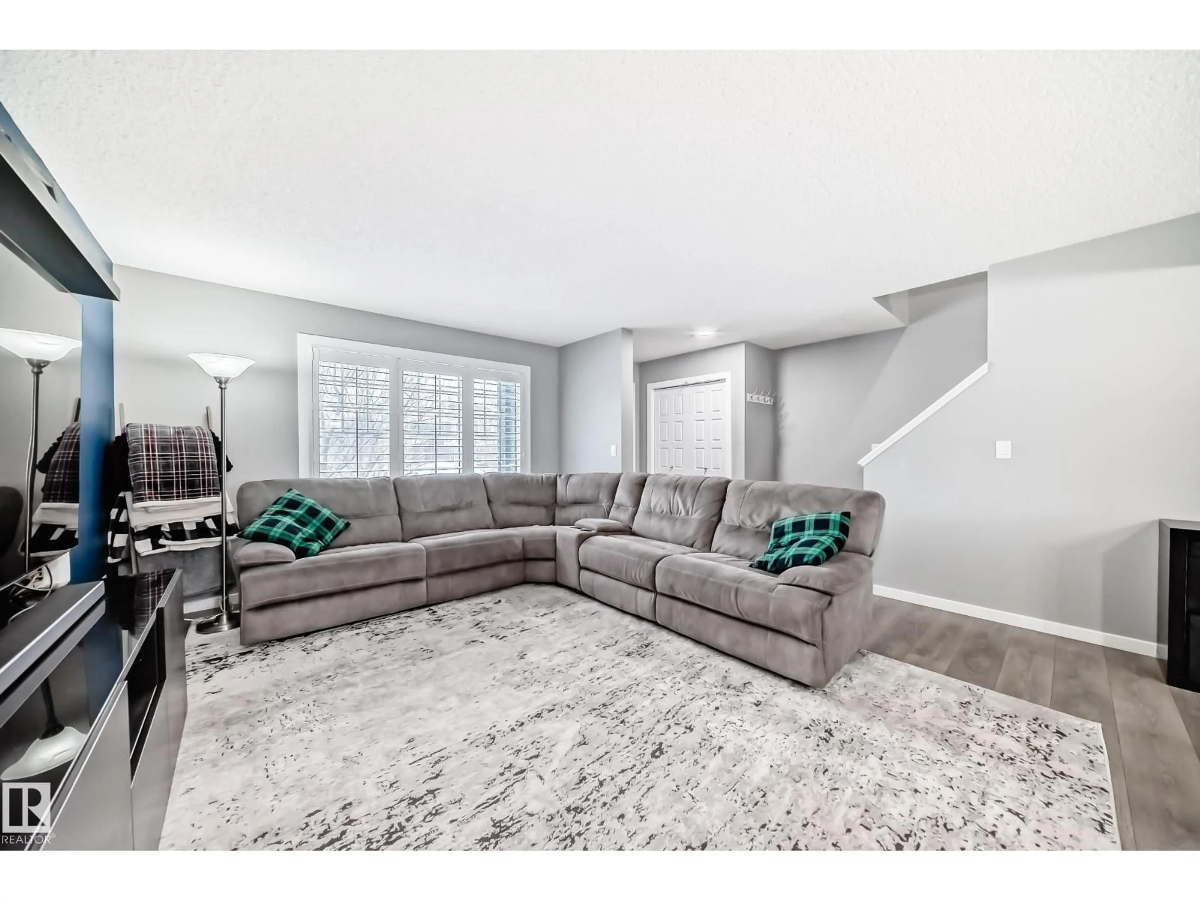 Living room with furniture, carpet floor for 5422 CRABAPPLE LO, Edmonton Alberta T6X1S5