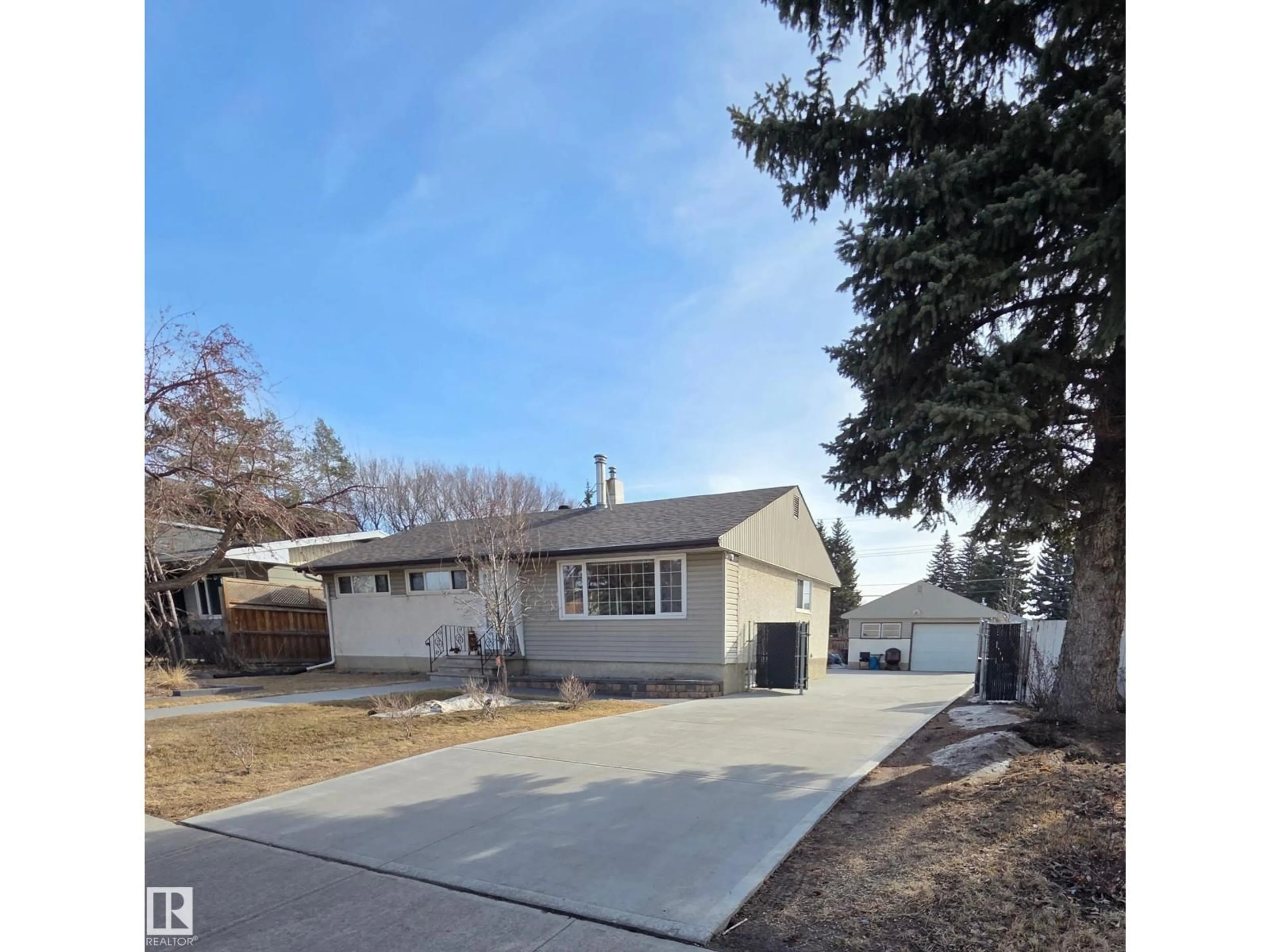 Home with vinyl exterior material, street for NW - 8603 149 ST, Edmonton Alberta T5R1B3