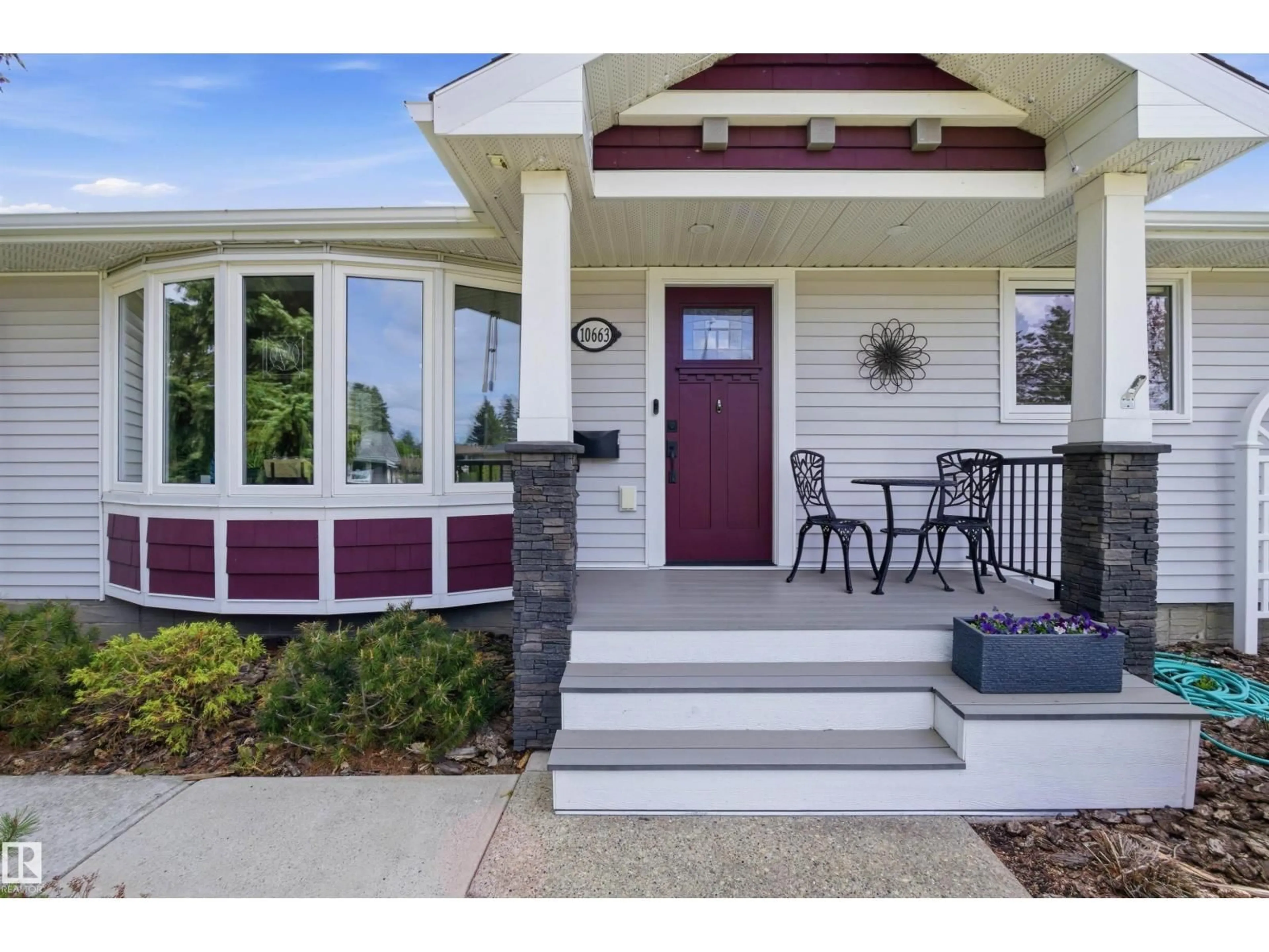 Home with vinyl exterior material, street for NW - 10663 59 ST, Edmonton Alberta T6A2K5