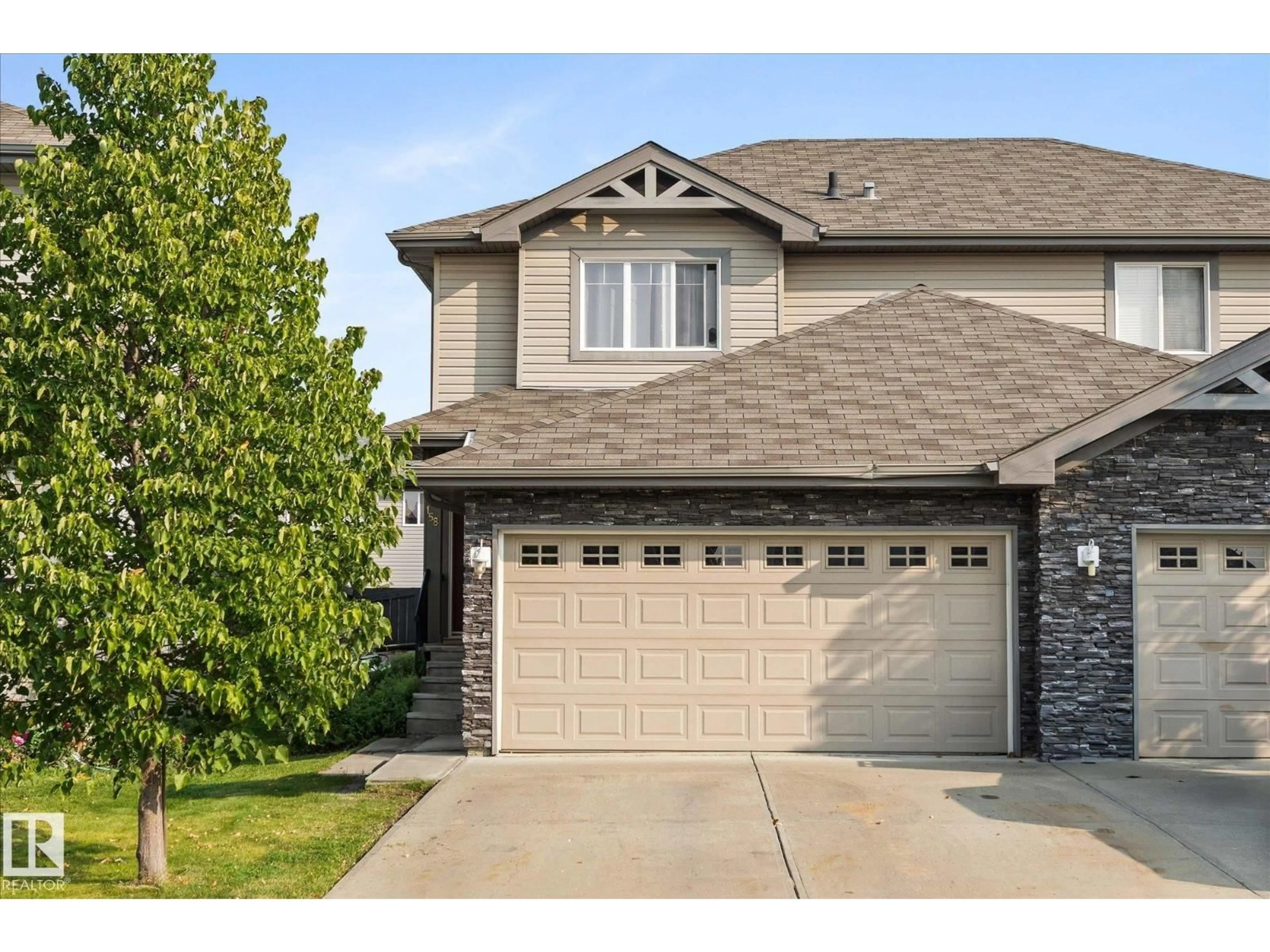 Home with vinyl exterior material, street for 158 CRANSTON PL, Fort Saskatchewan Alberta T8L0K9