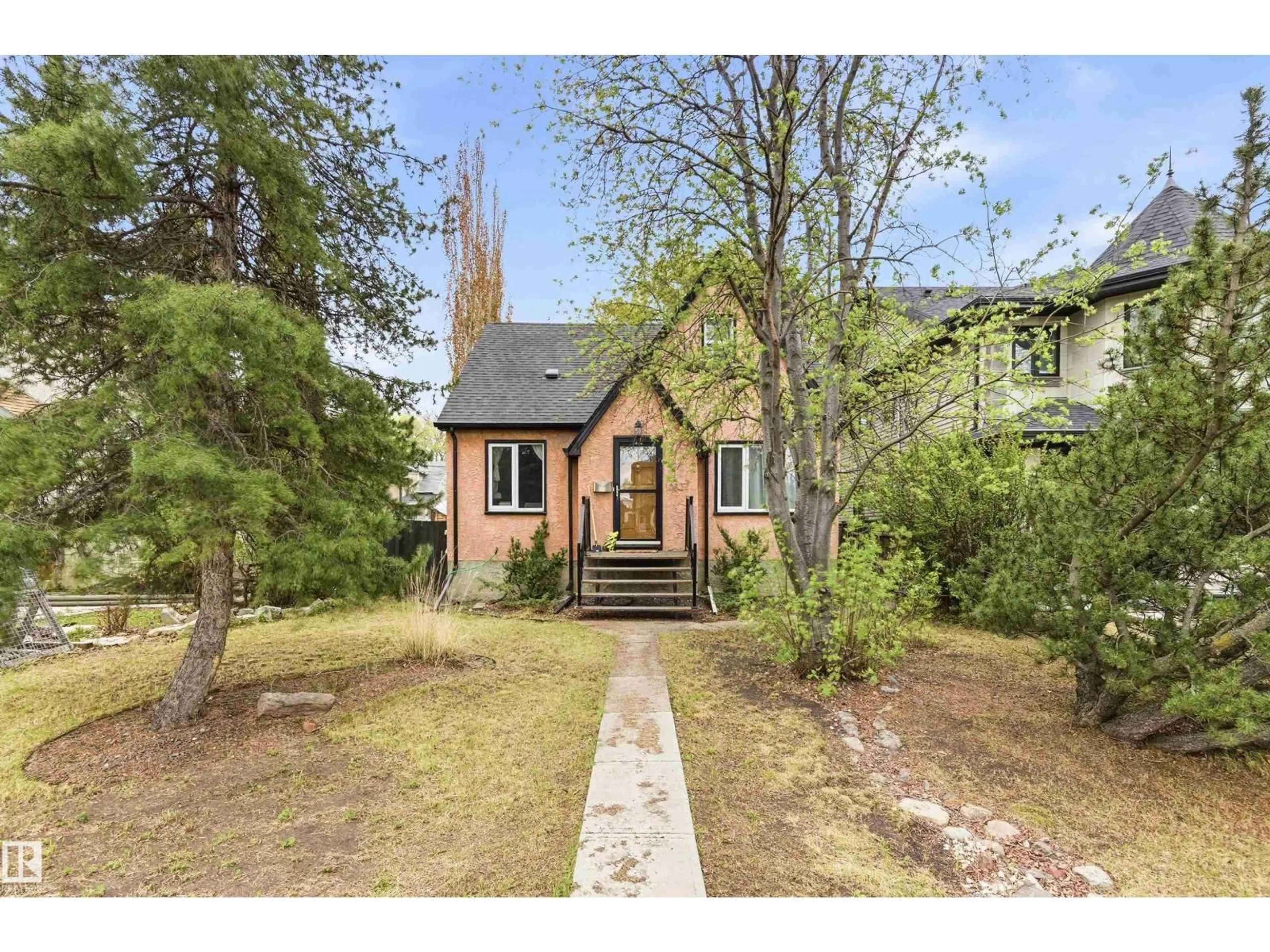 A pic from outside/outdoor area/front of a property/back of a property/a pic from drone, street for 10827 64 AV, Edmonton Alberta T6H1T3