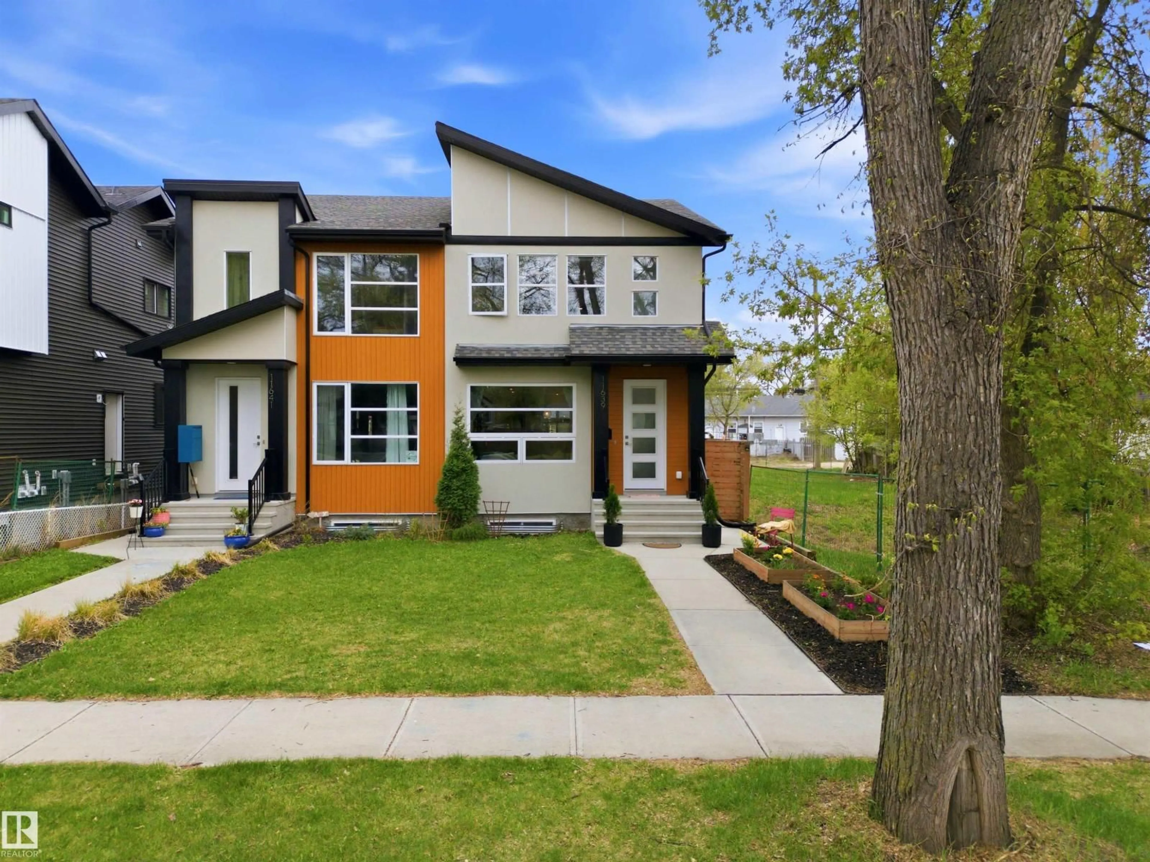 Home with brick exterior material, street for 11639 128 ST, Edmonton Alberta T5M0X3