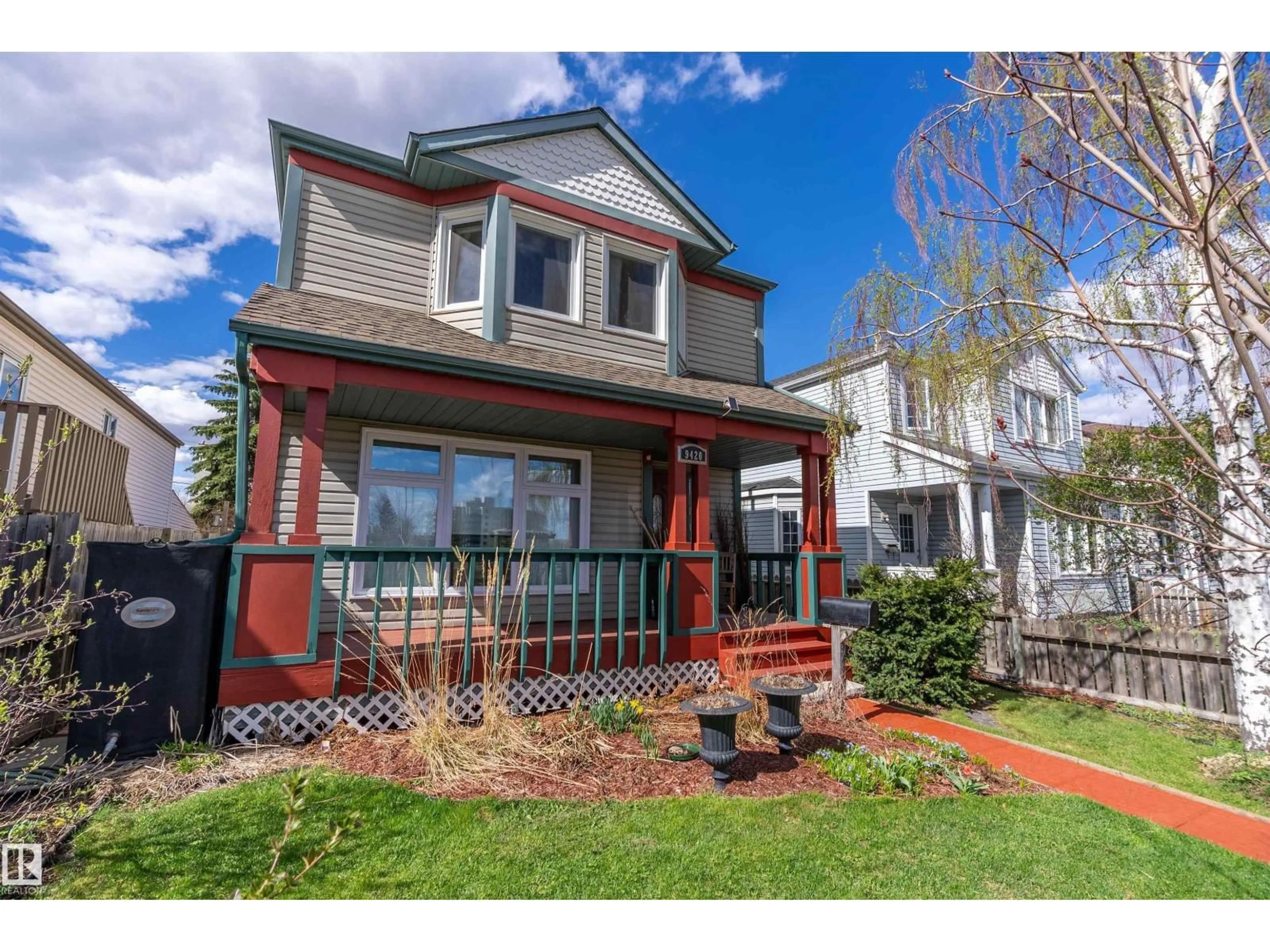 Home with vinyl exterior material, street for 9420 102A AV, Edmonton Alberta T5H4L7