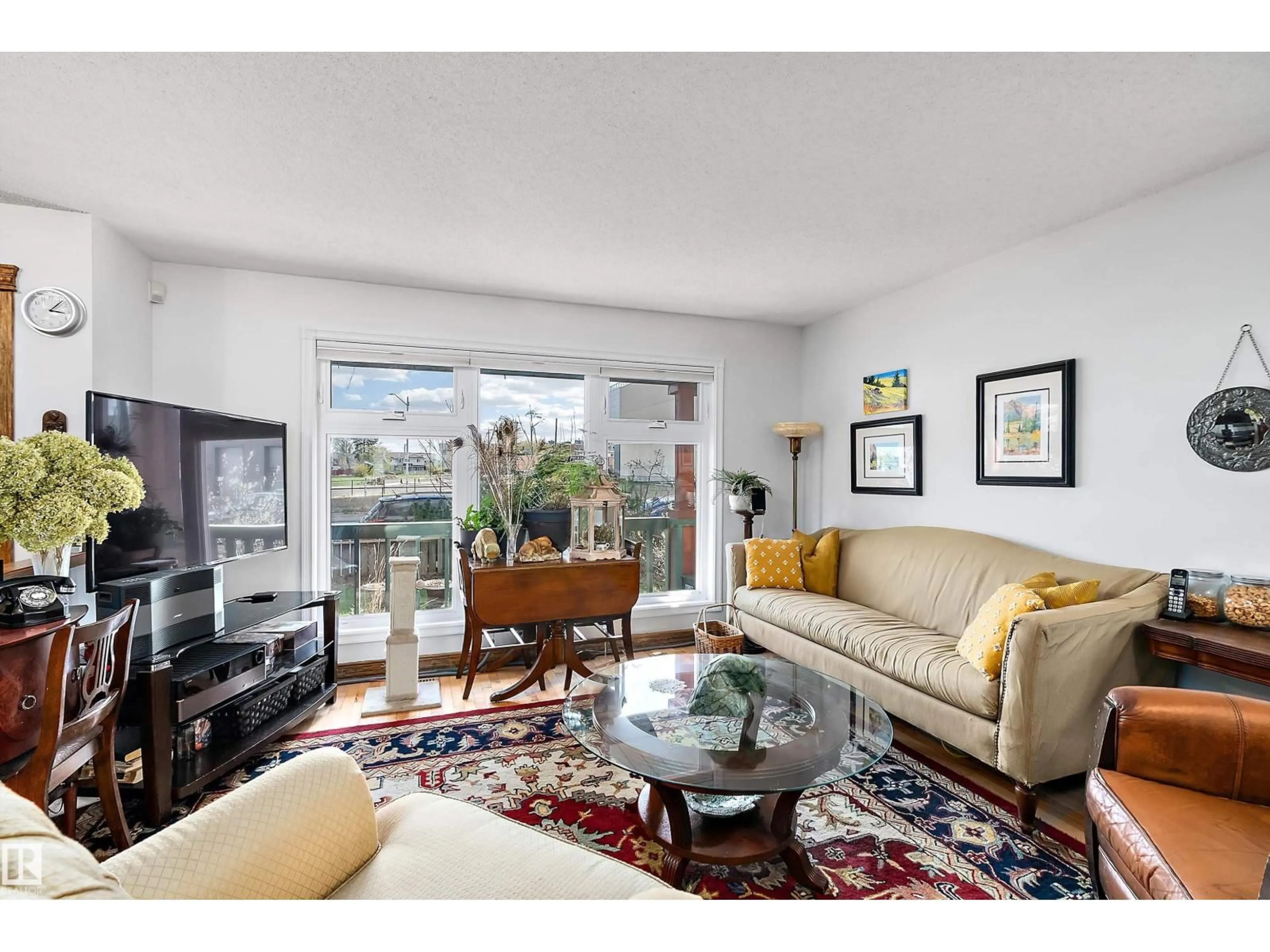 Living room with furniture, unknown for 9420 102A AV, Edmonton Alberta T5H4L7