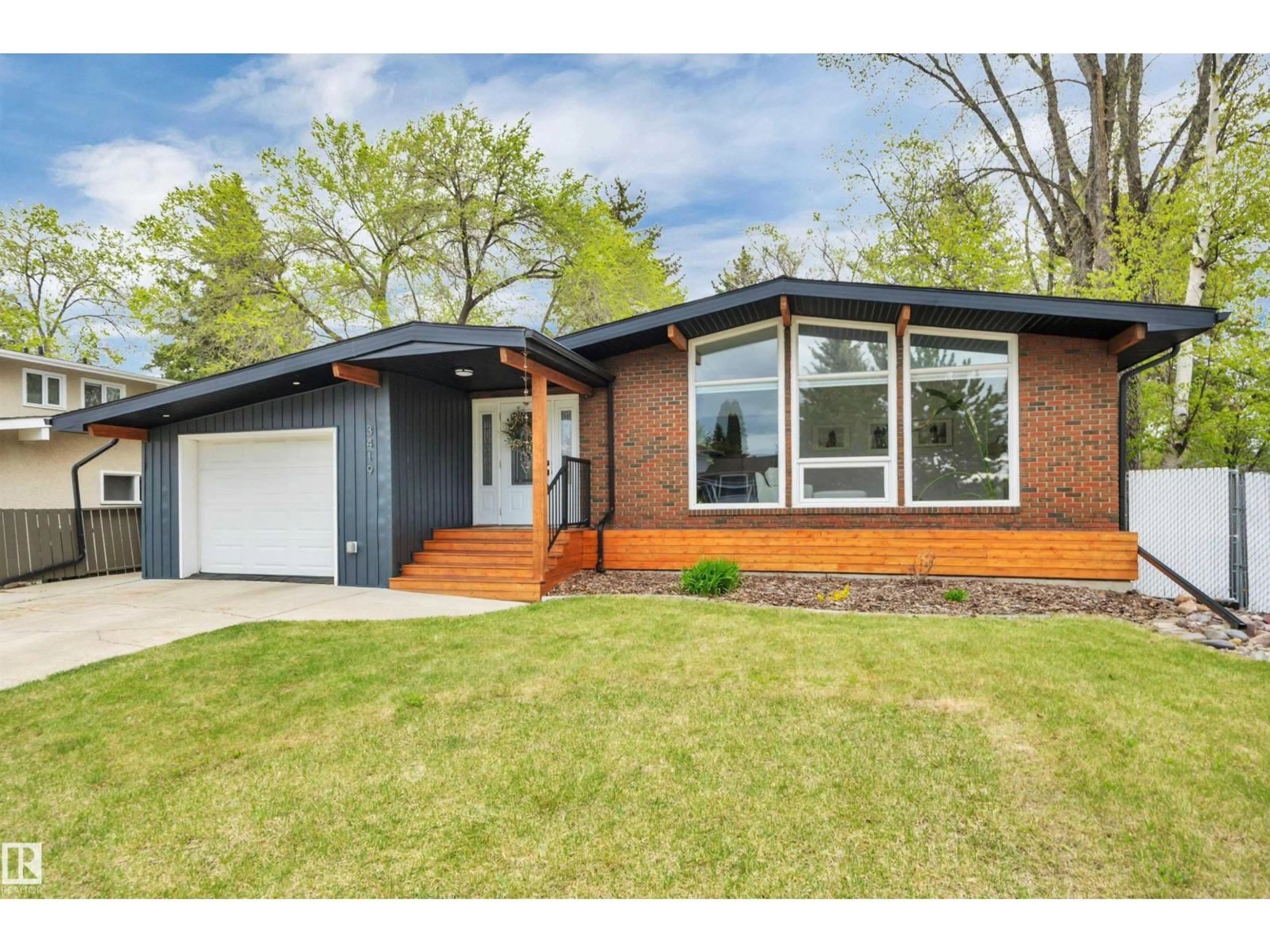Home with brick exterior material, street for 3419 84 ST, Edmonton Alberta T6K0G9