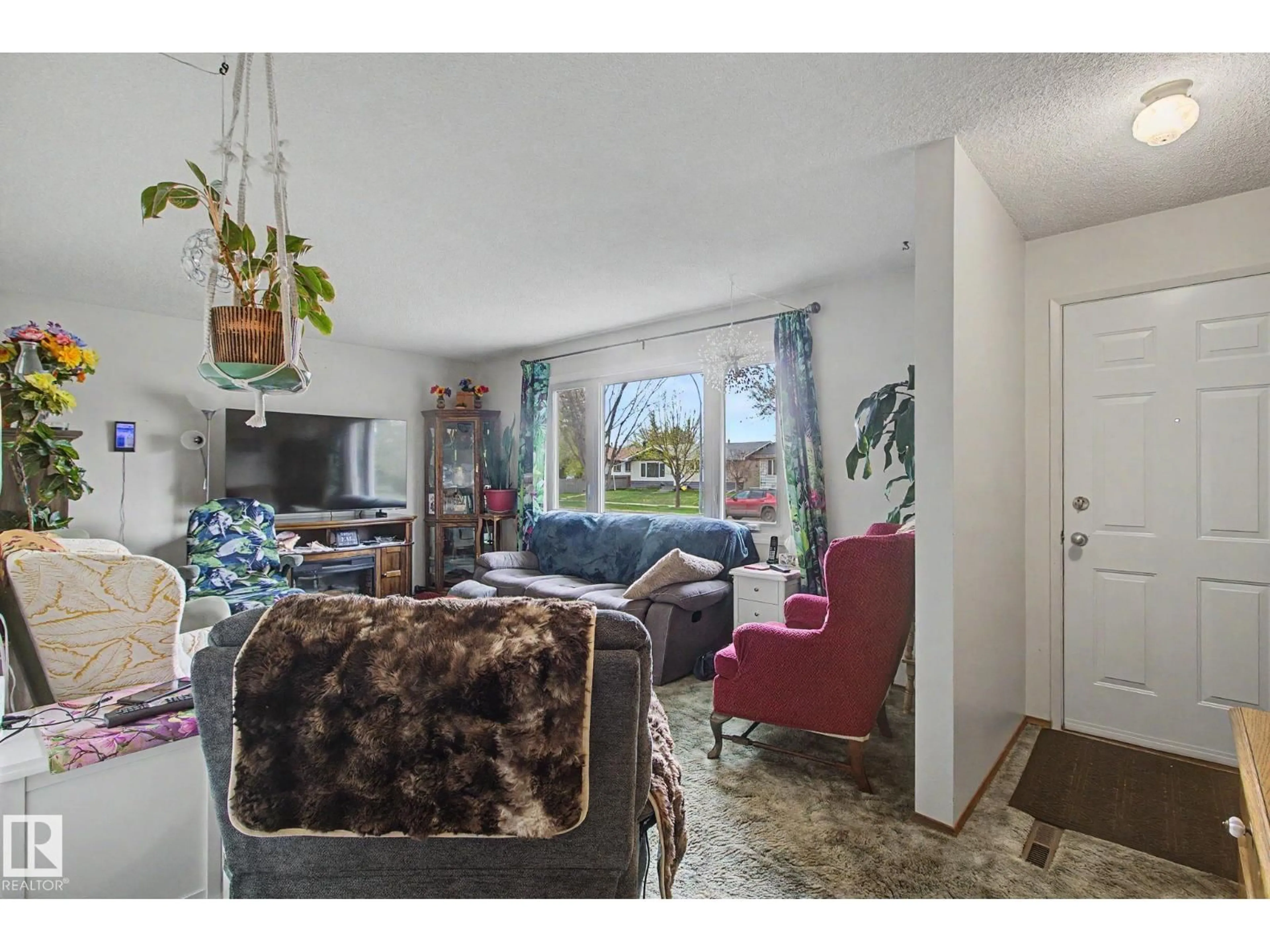Living room with furniture, unknown for NW - 8115 169 ST, Edmonton Alberta T5R2W4