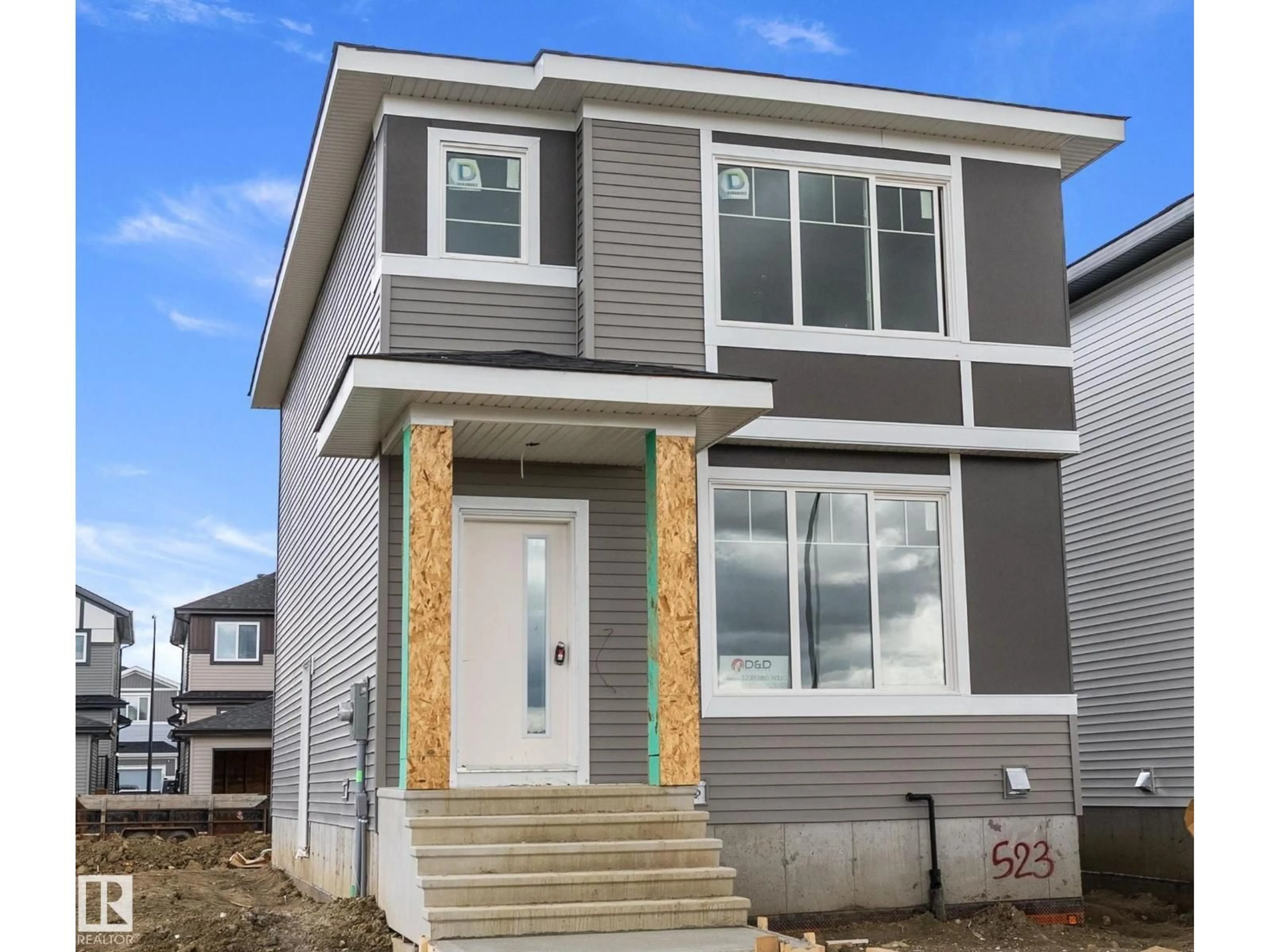Home with vinyl exterior material, street for 523 ROBINSON BV, Leduc Alberta T9E1P8