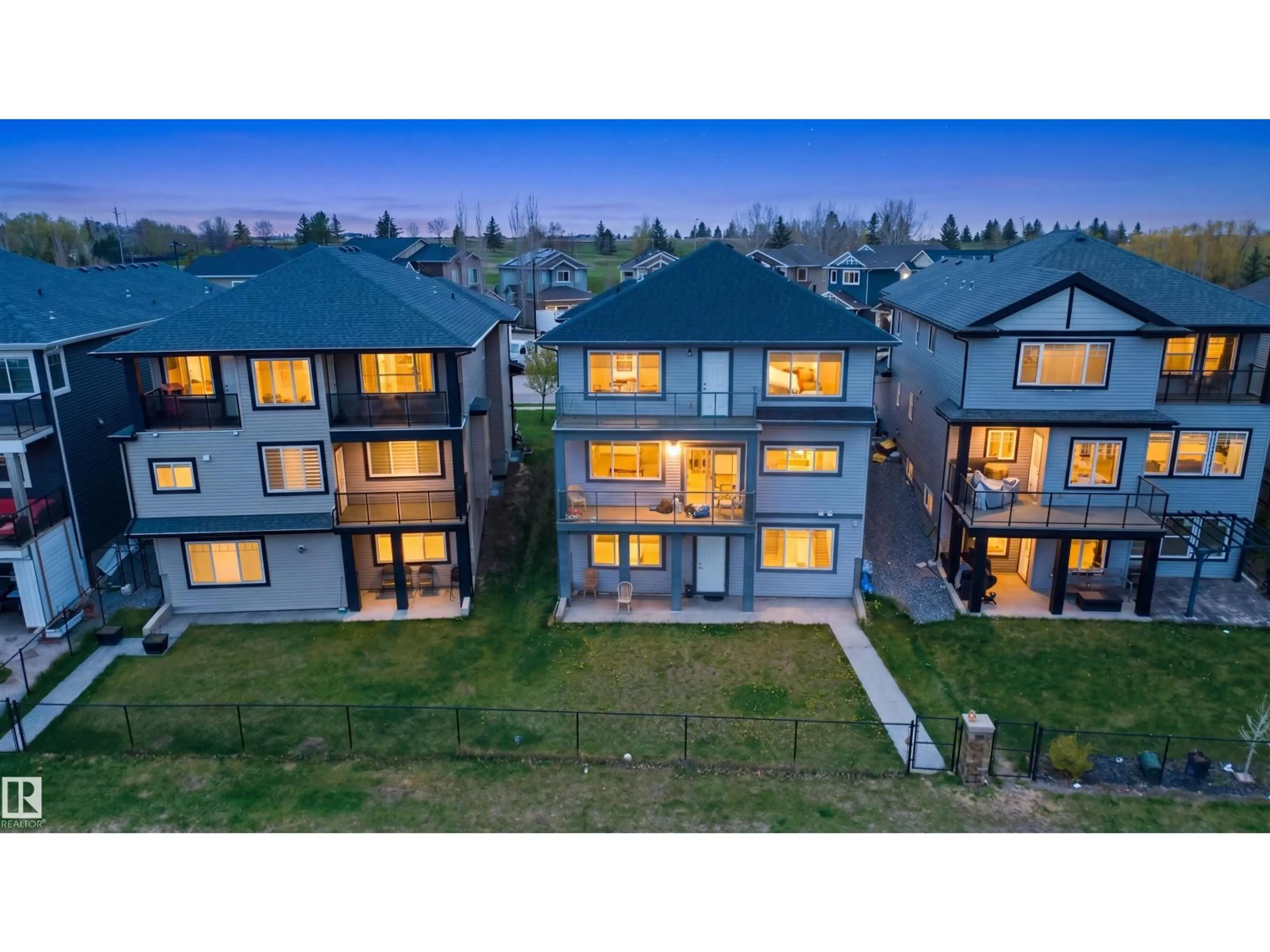 A pic from outside/outdoor area/front of a property/back of a property/a pic from drone, mountain view for 3909 49 AVE, Beaumont Alberta T4X1Y7
