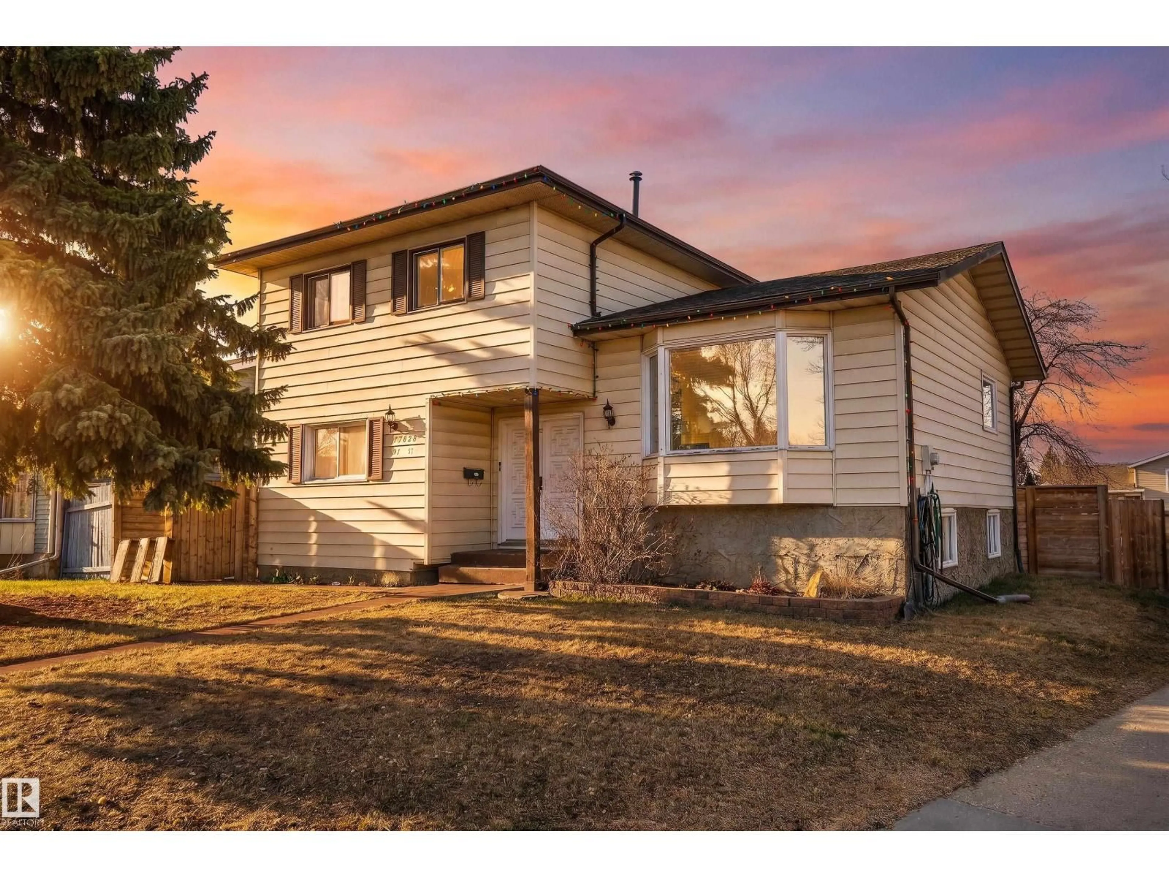 Home with vinyl exterior material, street for 17828 91 ST, Edmonton Alberta T5Z2L1
