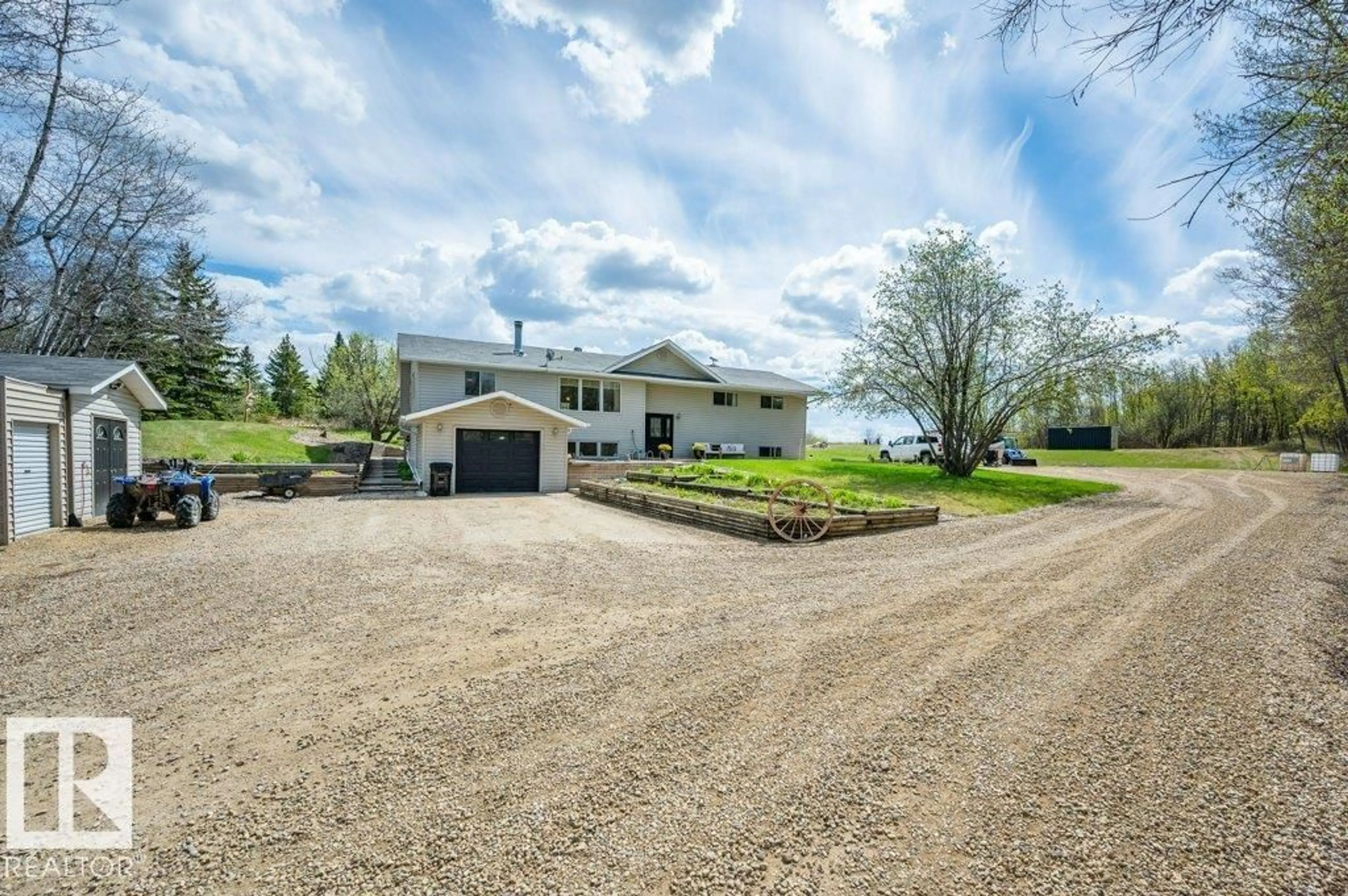 A pic from outside/outdoor area/front of a property/back of a property/a pic from drone, water/lake/river/ocean view for 51112 - 334 RANGE ROAD 222, Rural Strathcona County Alberta T8C1G9