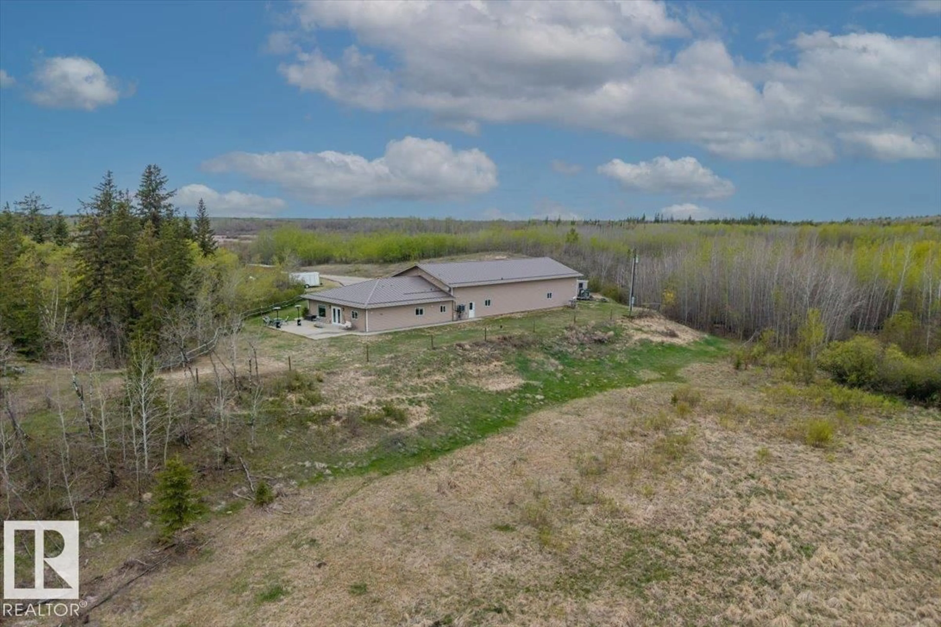 A pic from outside/outdoor area/front of a property/back of a property/a pic from drone, water/lake/river/ocean view for 56515 RGE ROAD 222, Rural Sturgeon County Alberta T0A1N4