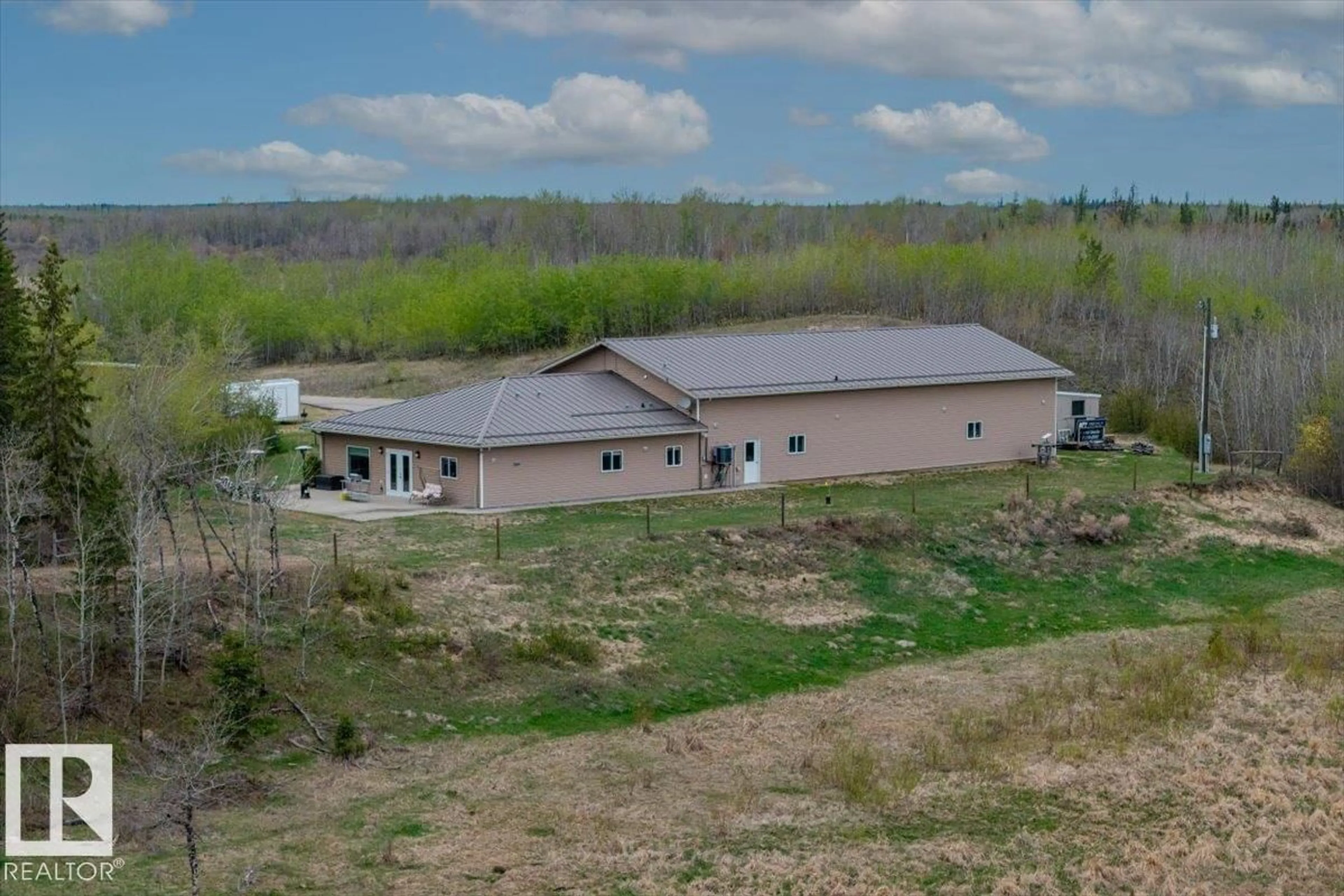 A pic from outside/outdoor area/front of a property/back of a property/a pic from drone, building for 56515 RGE ROAD 222, Rural Sturgeon County Alberta T0A1N4