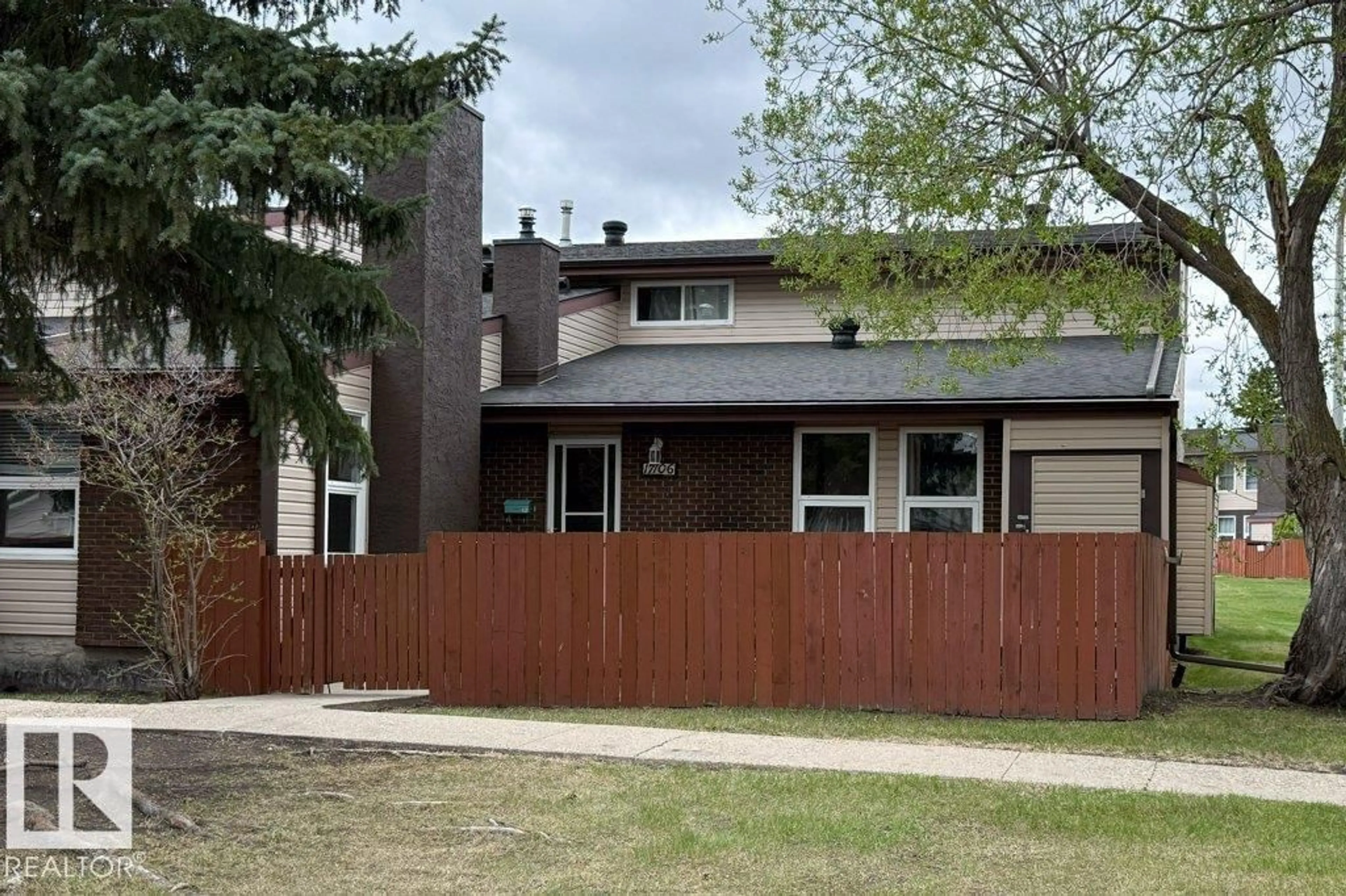 Home with vinyl exterior material, street for 17106 108 ST NW, Edmonton Alberta T5X3C6