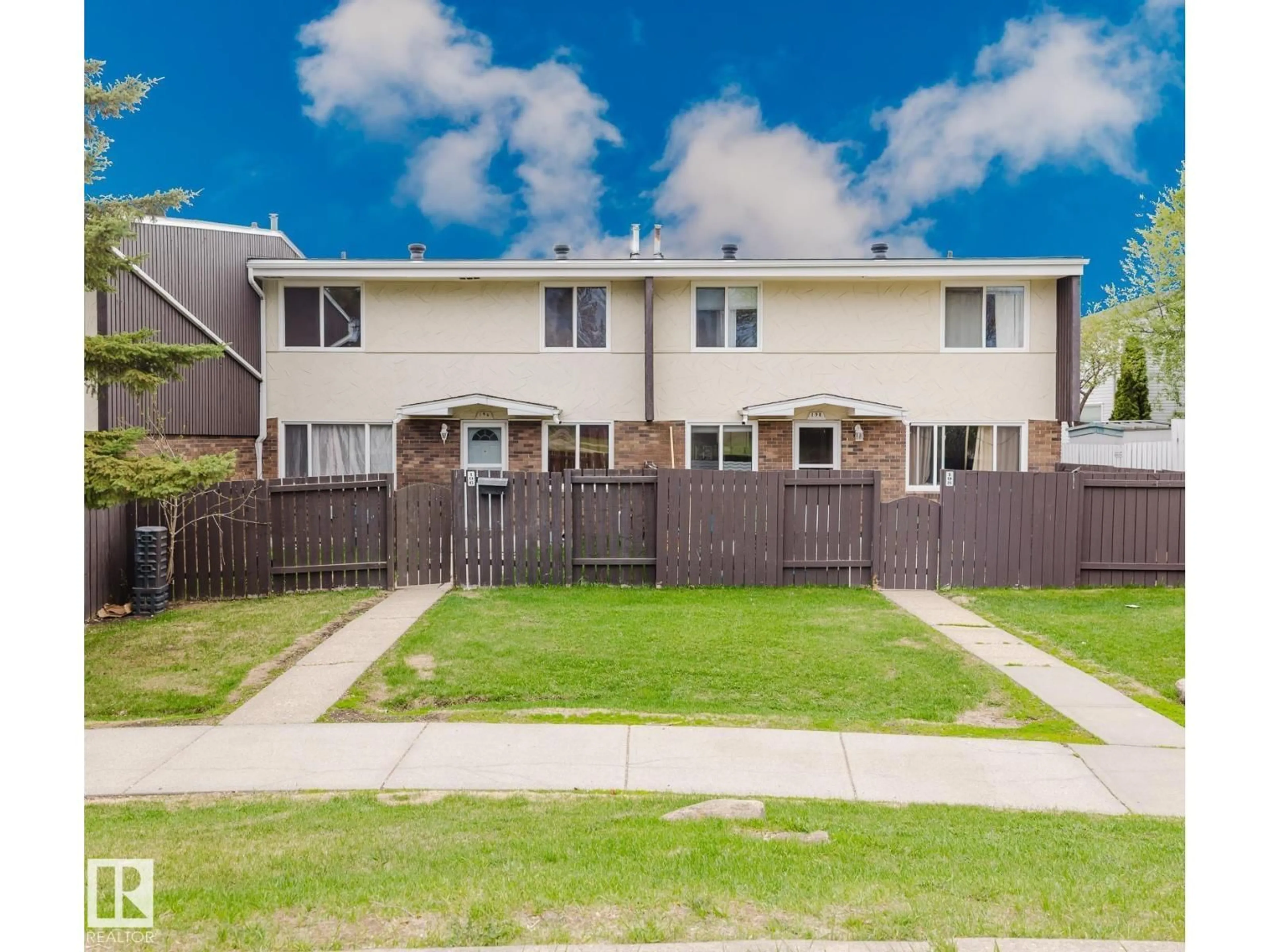 A pic from outside/outdoor area/front of a property/back of a property/a pic from drone, street for NW - 196 ROSELAND VG, Edmonton Alberta T5E5R6