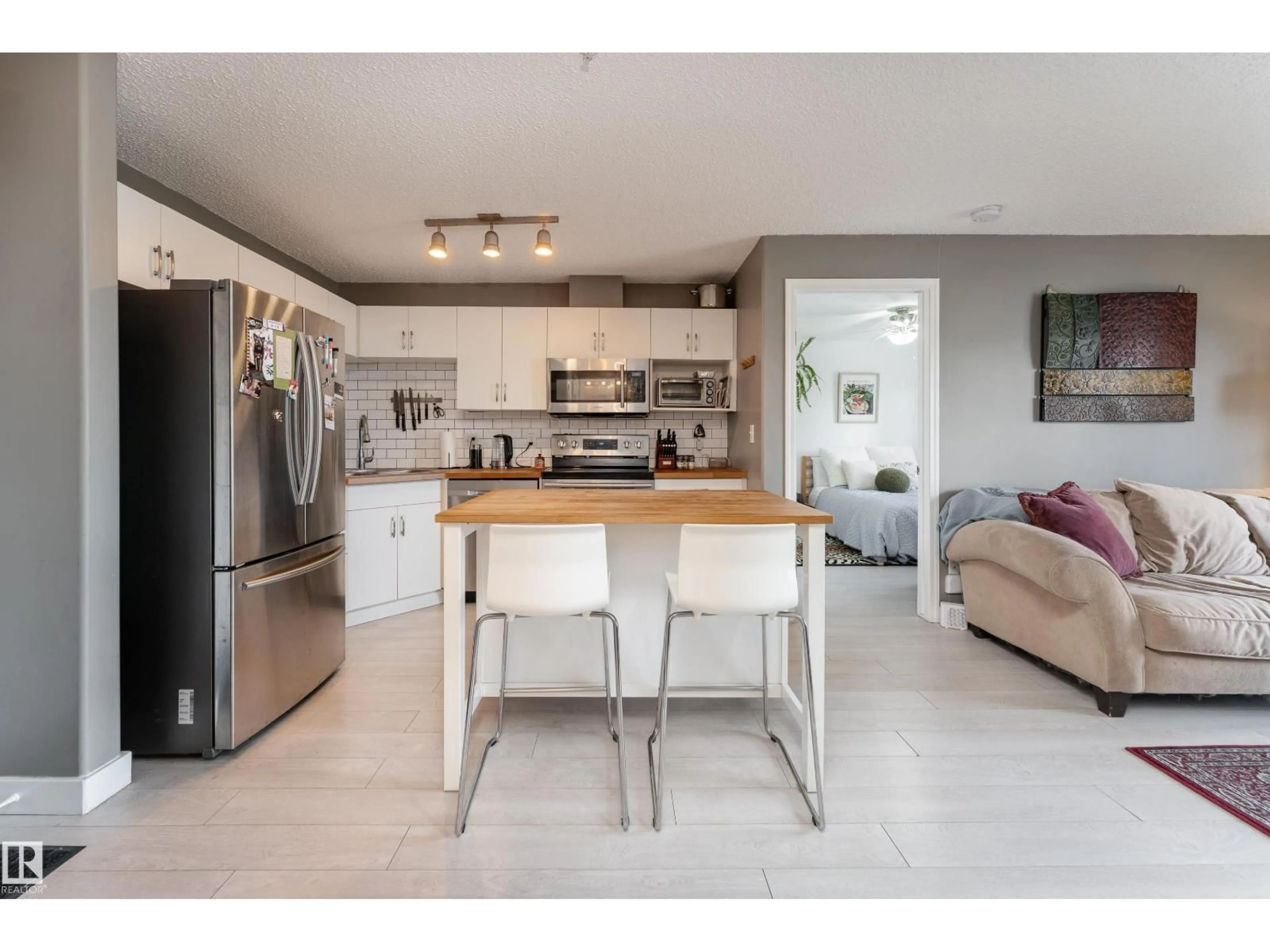 Open concept kitchen, ceramic/tile floor for 408 - 10535 122 STREET NW, Edmonton Alberta T5N4B7