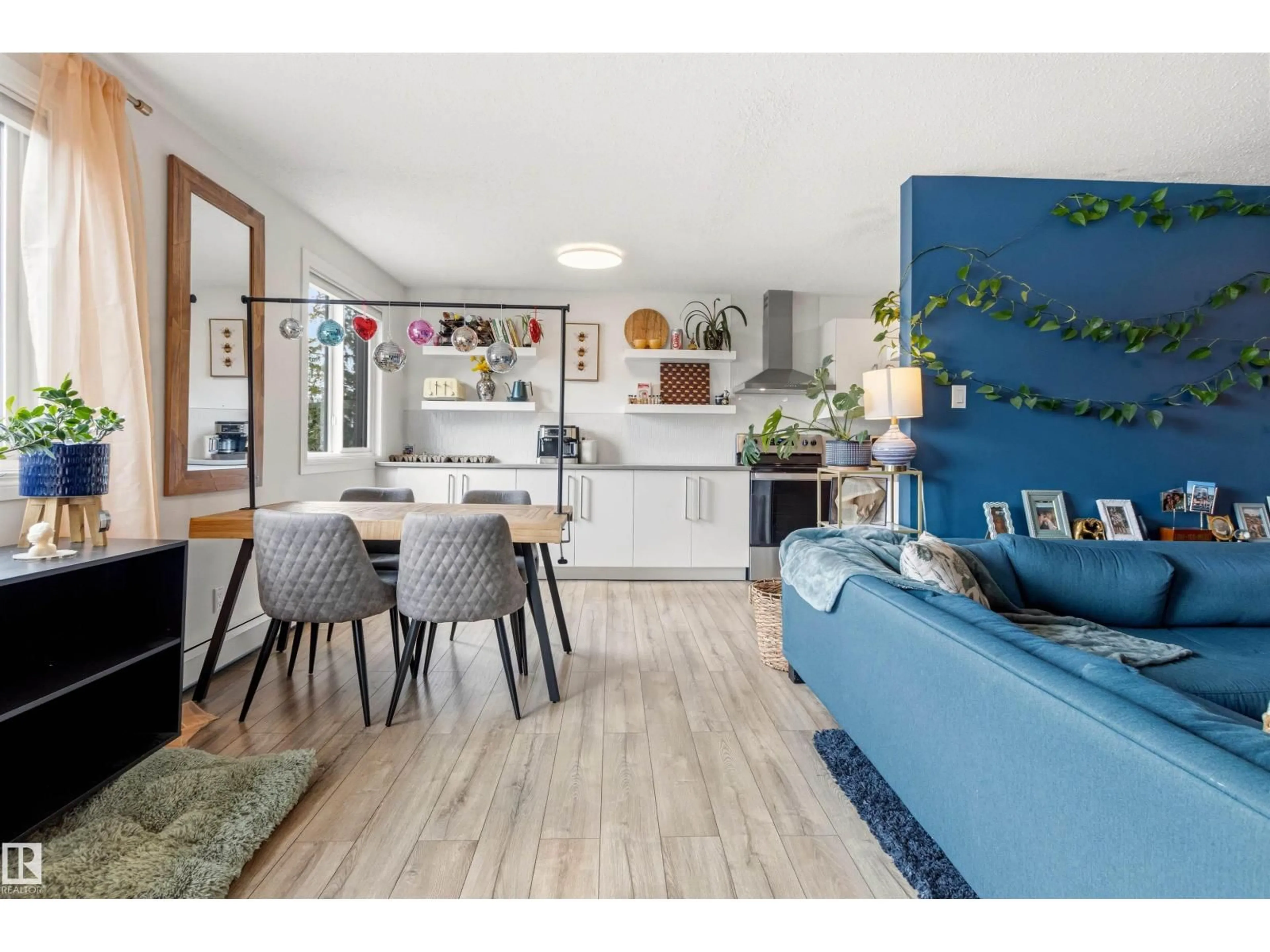 Open concept kitchen, wood/laminate floor for 14819 - 217 51 AV, Edmonton Alberta T6H5G4