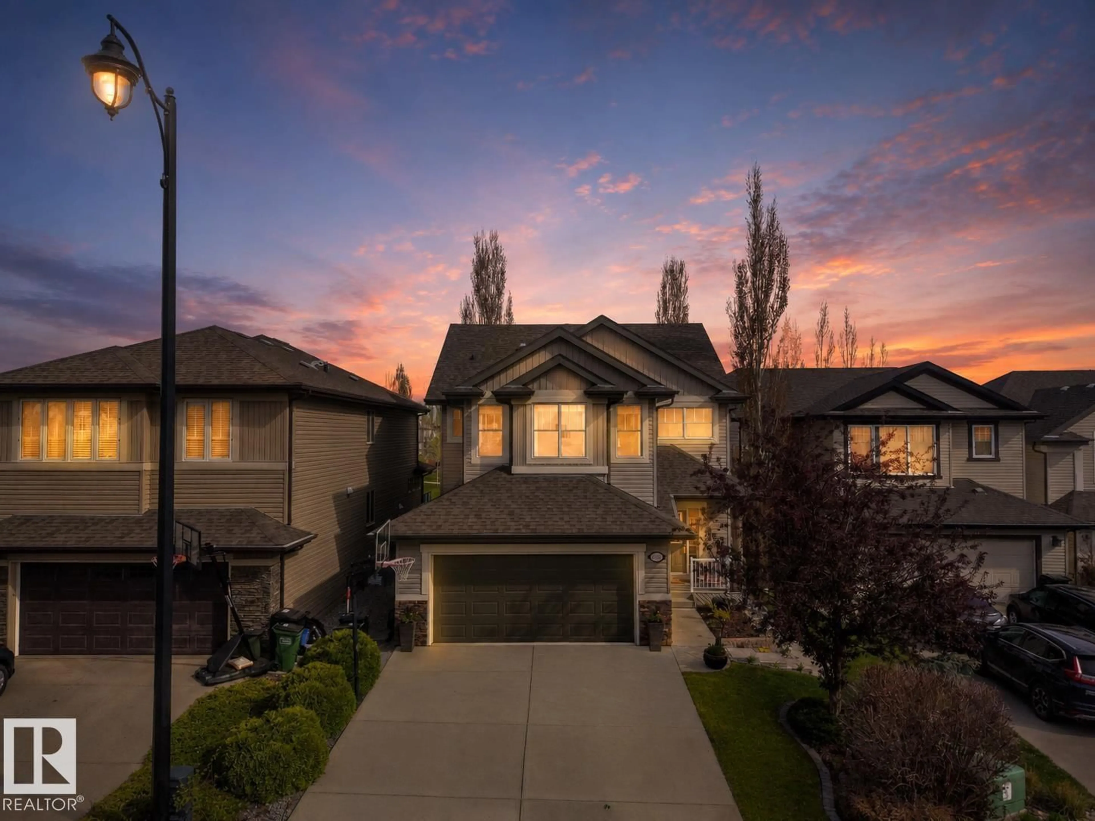 A pic from outside/outdoor area/front of a property/back of a property/a pic from drone, street for 20722 56A AV, Edmonton Alberta T6M0E7