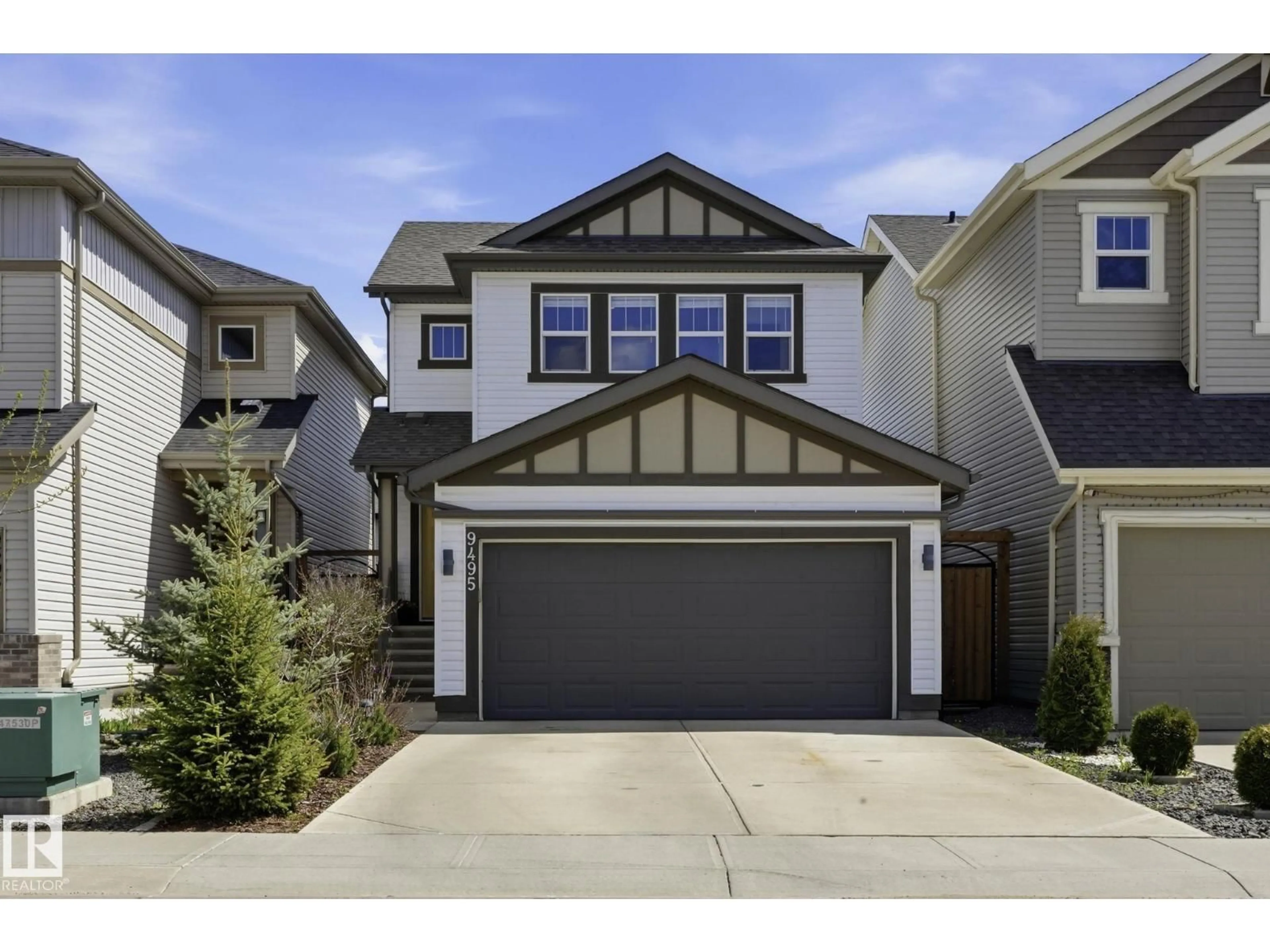 Home with vinyl exterior material, street for NW - 9495 228 ST, Edmonton Alberta T5T7H5