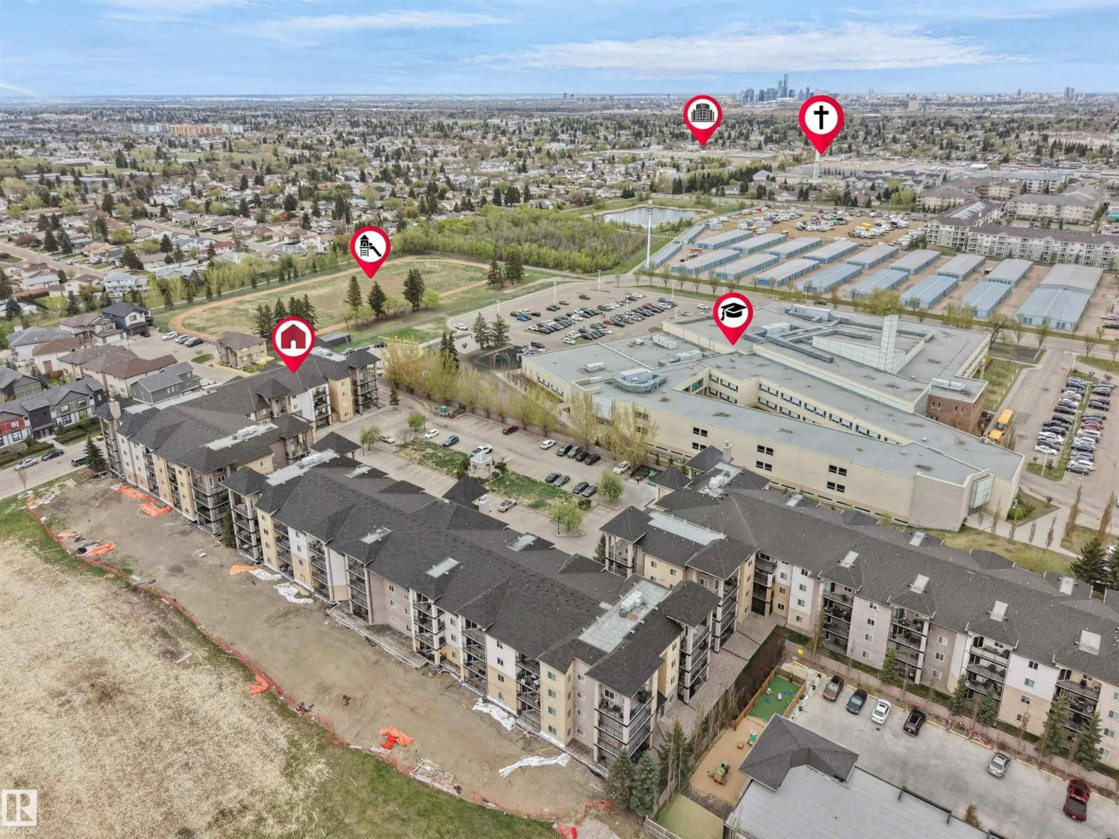 A pic from outside/outdoor area/front of a property/back of a property/a pic from drone, street for #104 - 14612 125 ST, Edmonton Alberta T5X0B6